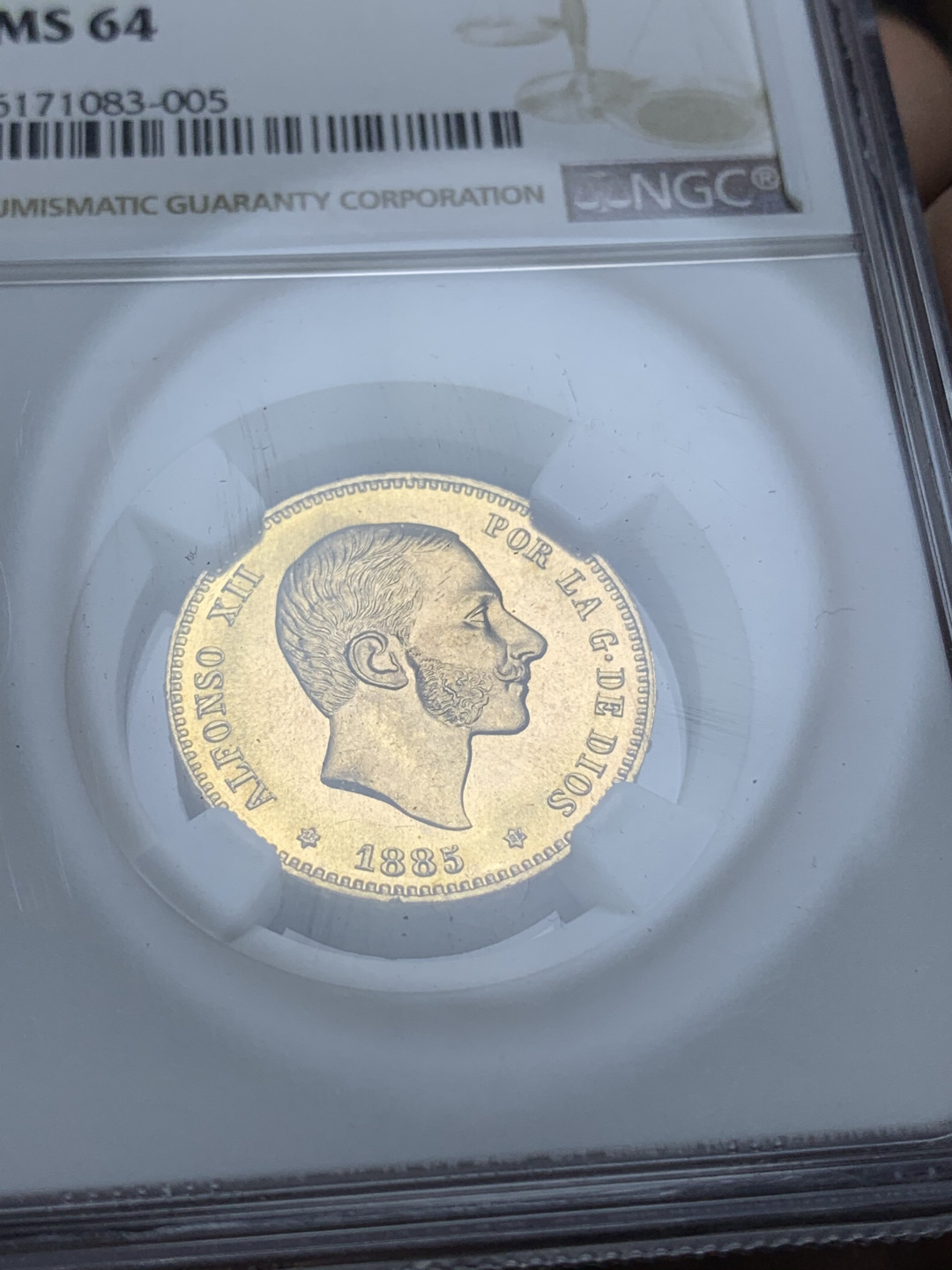 《竞宝斋》钱币微拍-第4场（0佣金包邮） NGC-MS64 西班牙1885年阿方索十二世 25比塞塔金币 第三名 西系币权威拍卖行AUREO 七月份拍出一枚UNC-裸币 成交价2100欧 (不包含佣金)，  HA没有此币拍卖记录