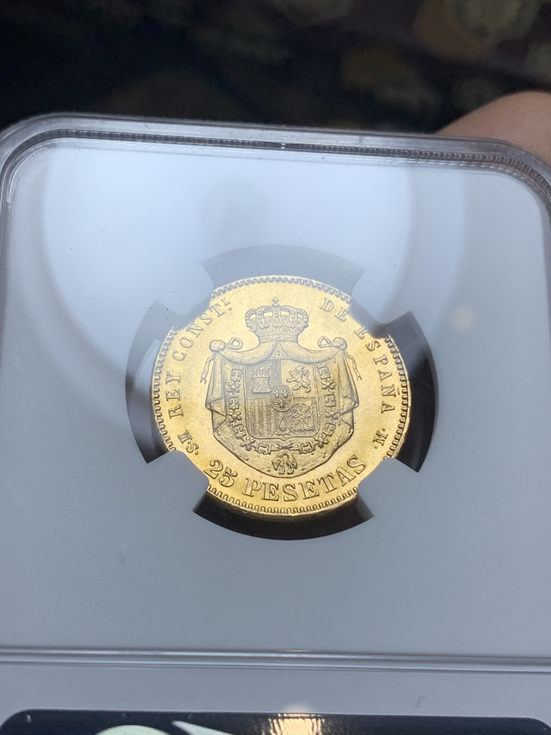 《竞宝斋》钱币微拍-第4场（0佣金包邮） NGC-MS64 西班牙1885年阿方索十二世 25比塞塔金币 第三名 西系币权威拍卖行AUREO 七月份拍出一枚UNC-裸币 成交价2100欧 (不包含佣金)，  HA没有此币拍卖记录