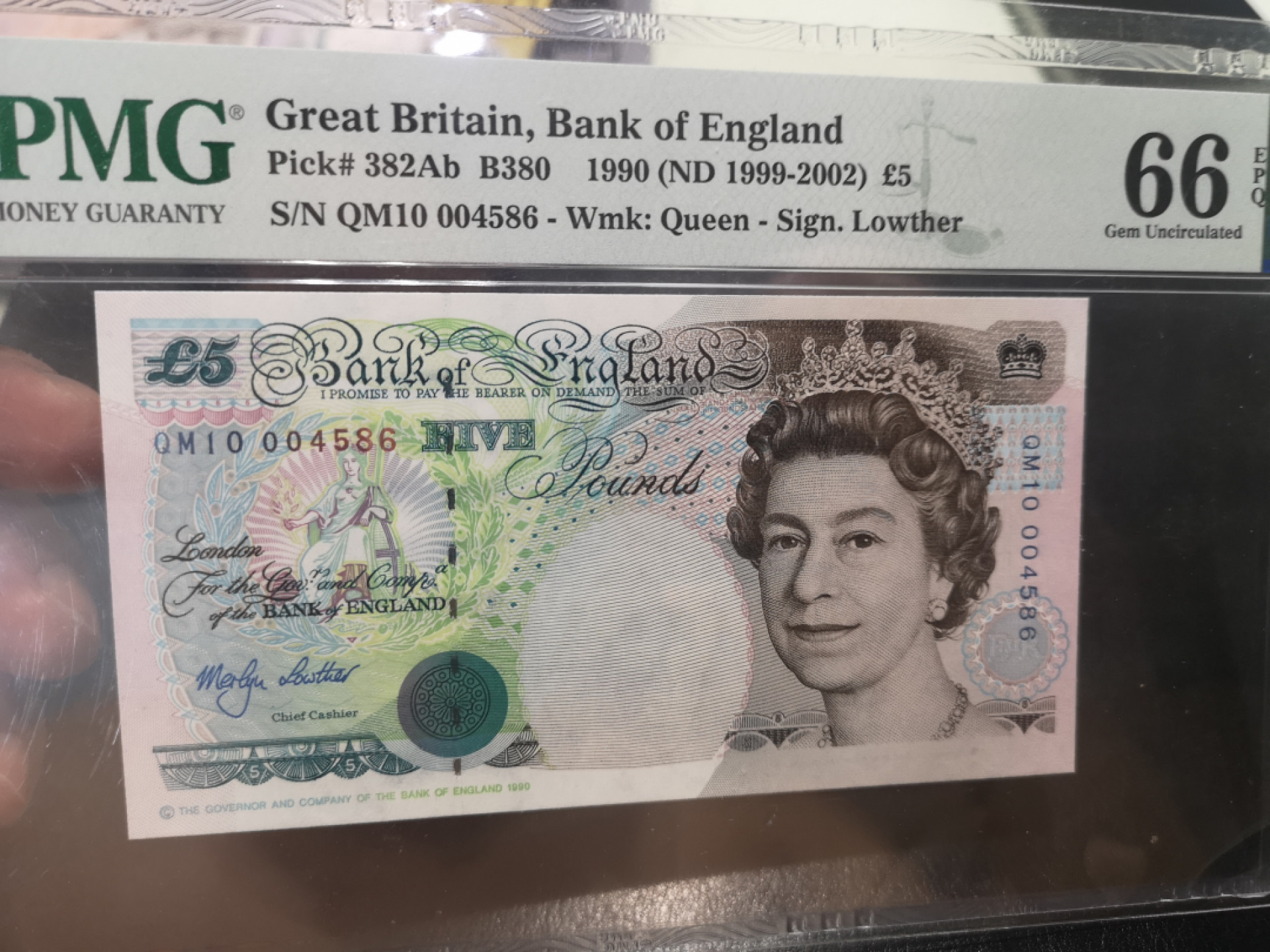 《外钞收藏家》第一百二十八期拍卖 1990英国 E序列 5镑  PMG66 千位号