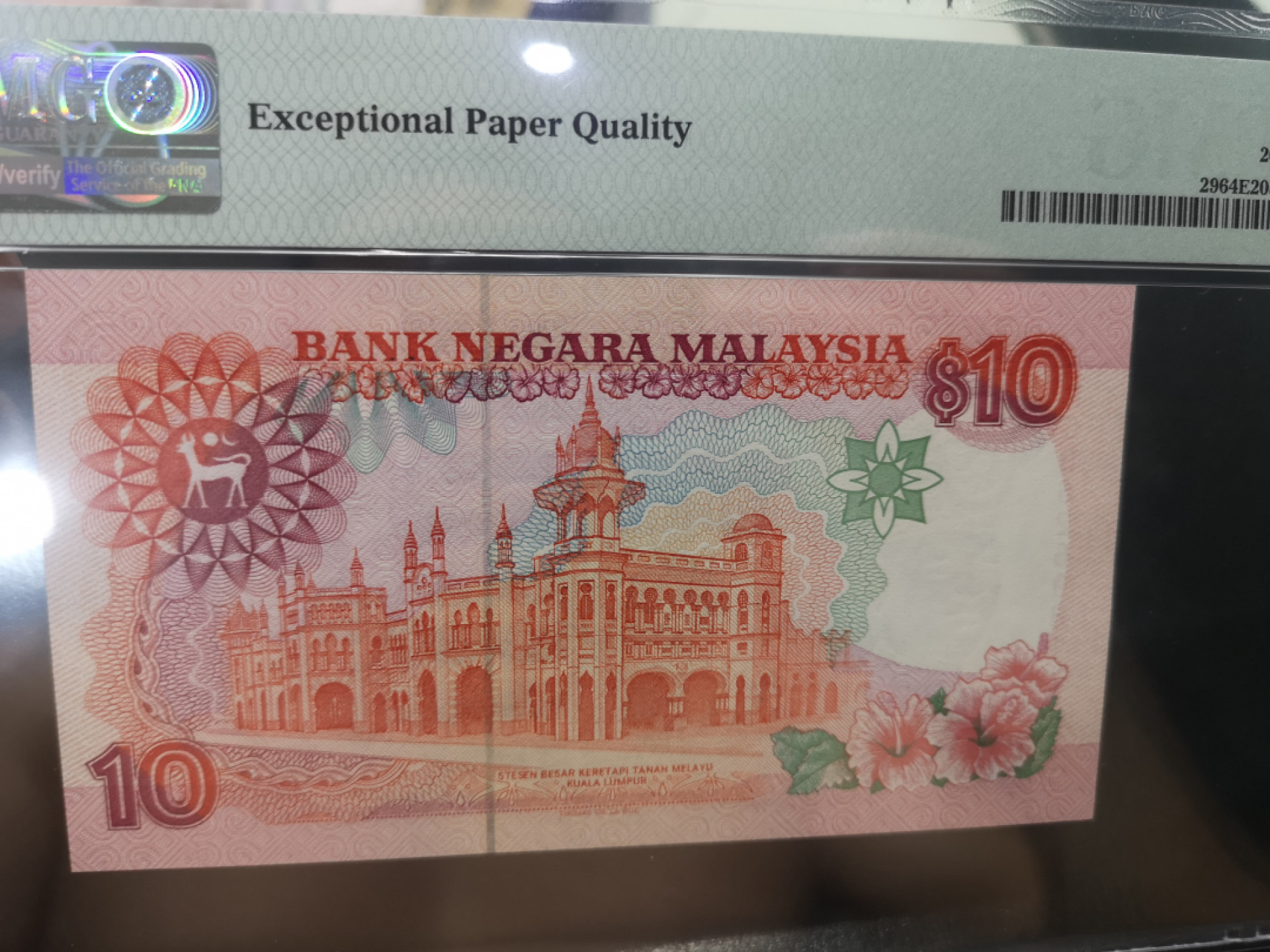 《外钞收藏家》第一百二十八期拍卖 1989年马来西亚 10林吉特 PMG64E