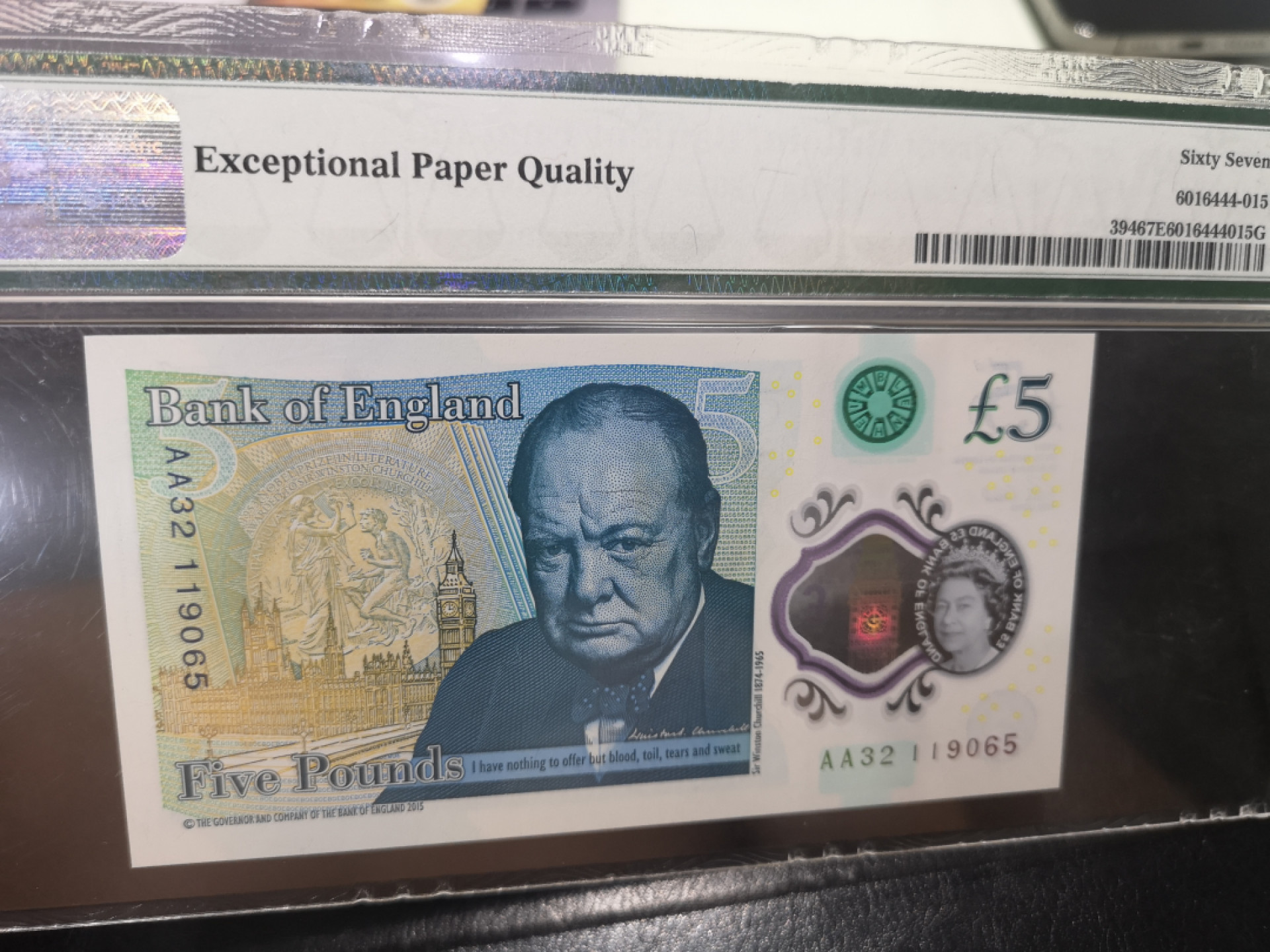 《外钞收藏家》第一百二十八期拍卖 2015英国 5镑 AA冠 PMG67