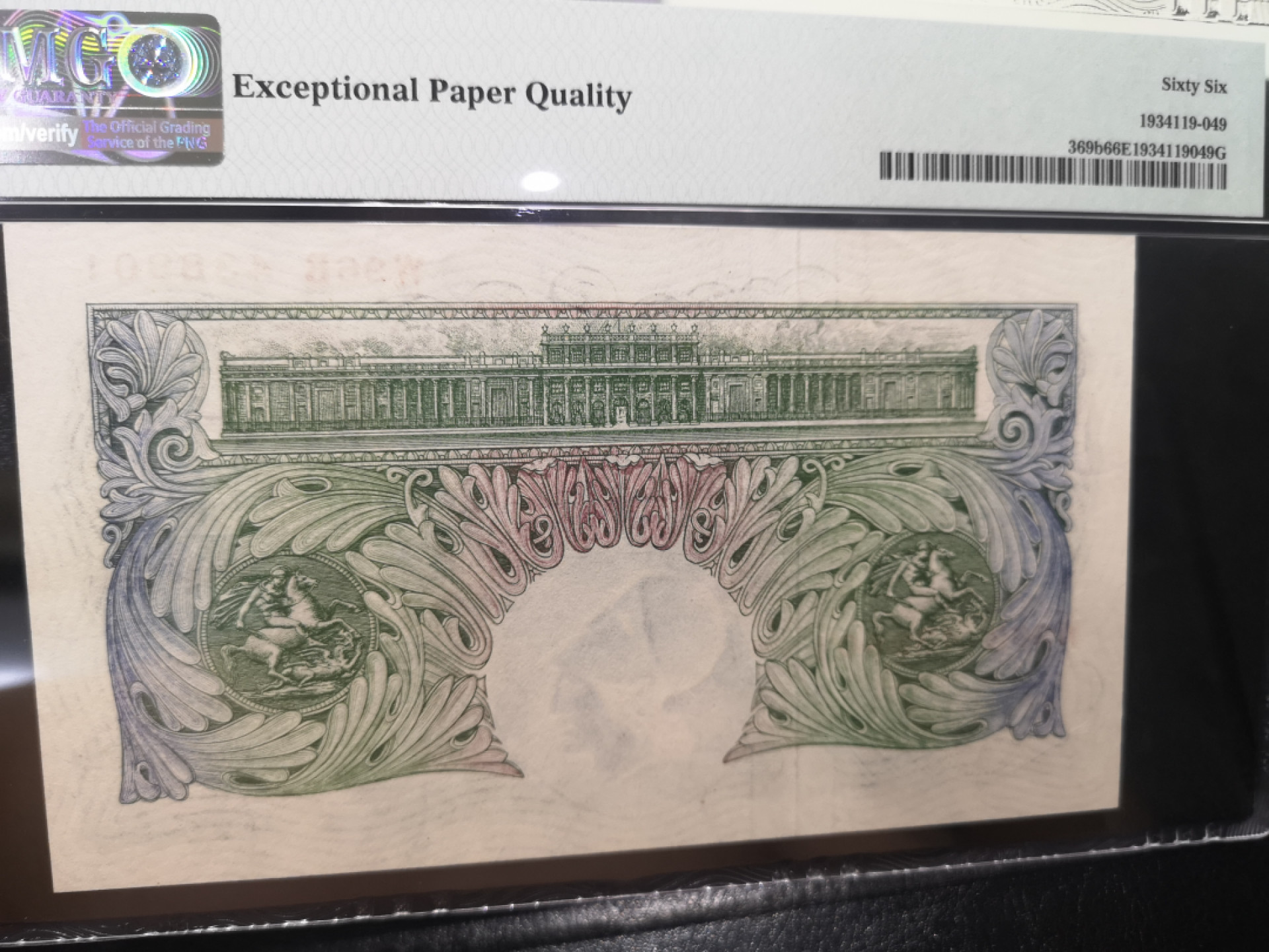 《外钞收藏家》第一百二十八期拍卖 1949-55年 A序列1镑 PMG66