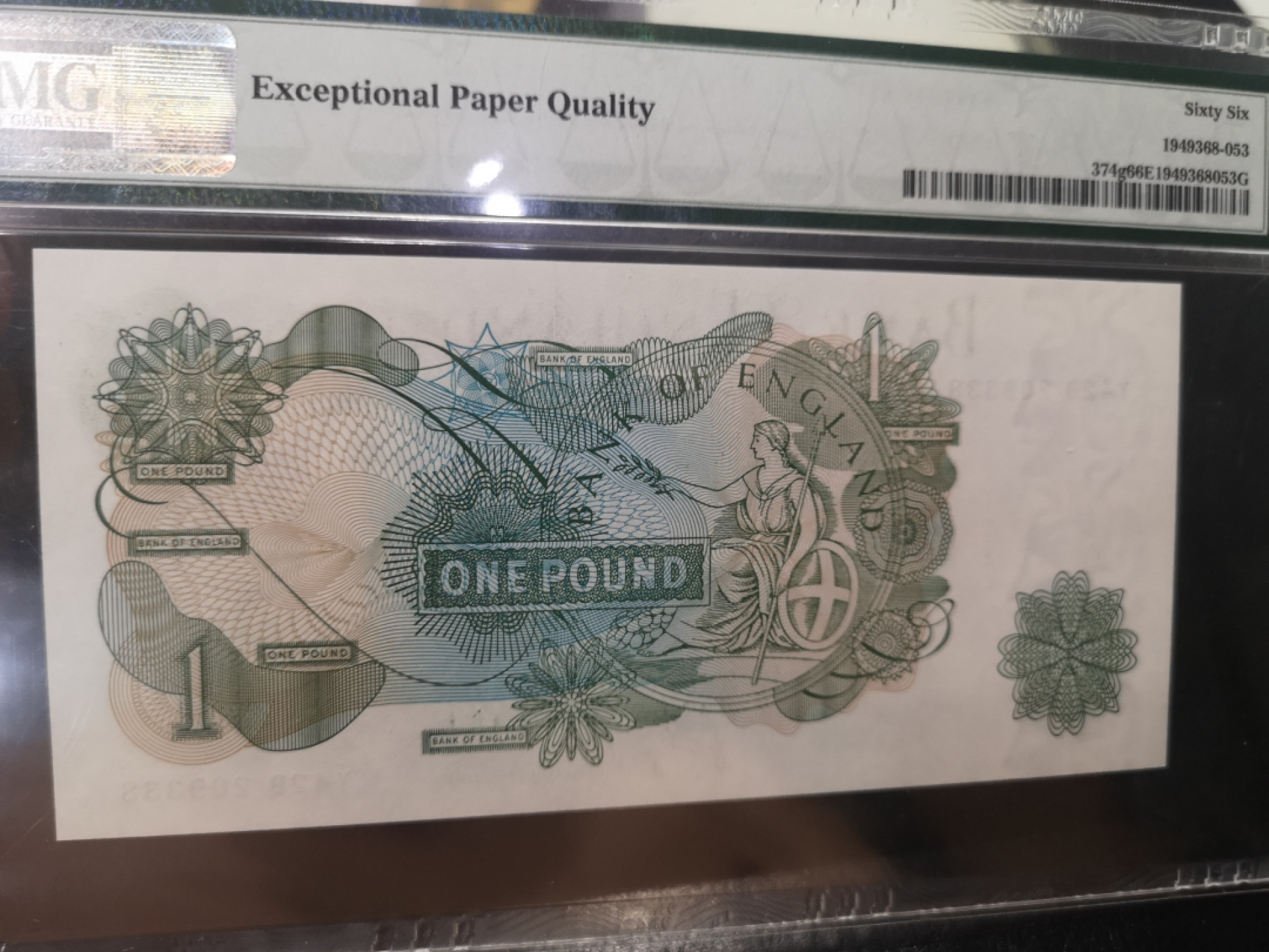 《外钞收藏家》第一百二十八期拍卖 1970-77年 C序列1镑 PMG66 尾8