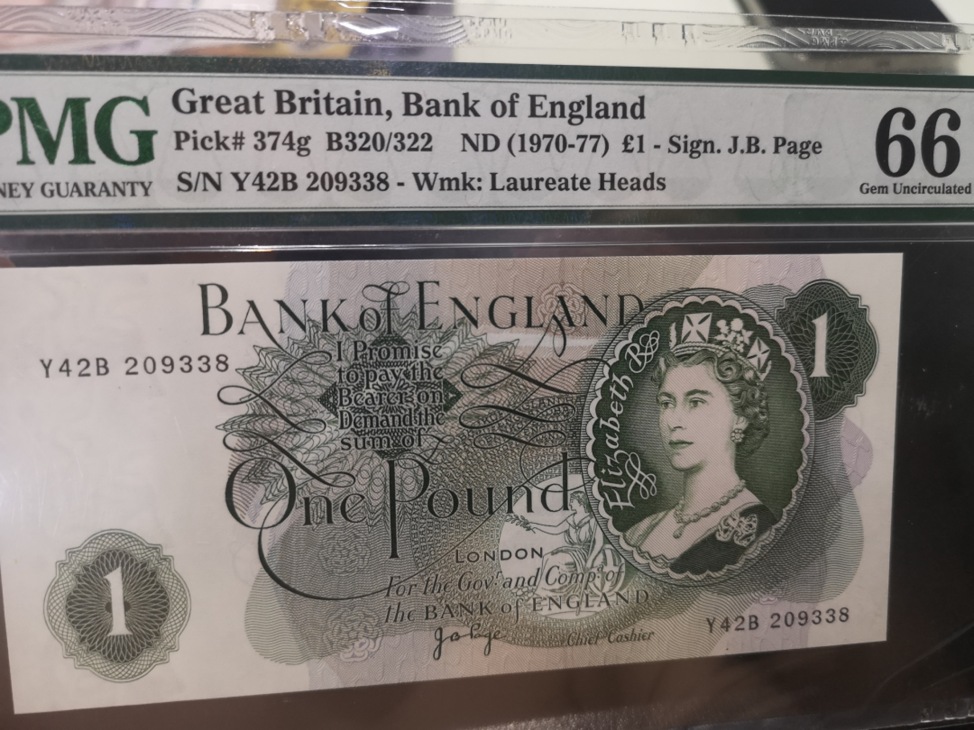 《外钞收藏家》第一百二十八期拍卖 1970-77年 C序列1镑 PMG66 尾8