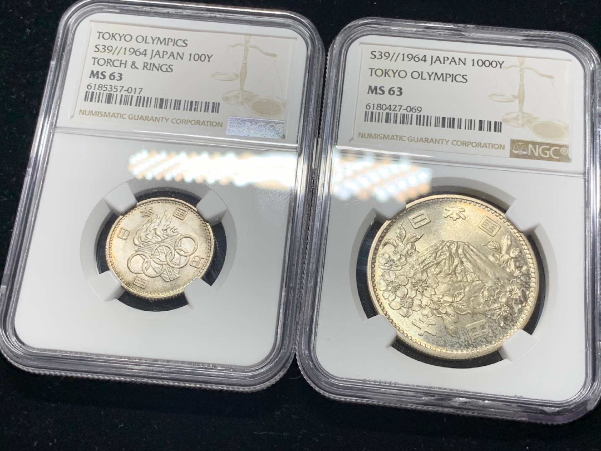 《竞宝斋》钱币微拍-第5场（0佣金包邮） 日本1964年 100，1000，MS63奥运银币一对 (其中一枚盒子下边缘有破损)