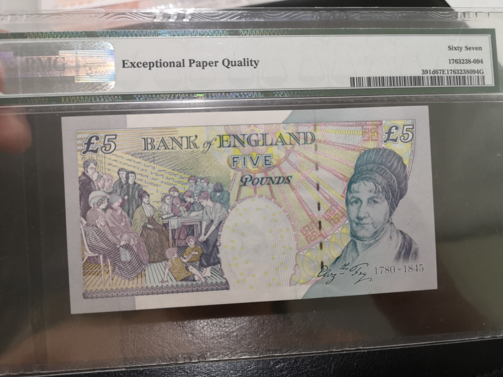 《外钞收藏家》第一百三十期拍卖 2002年英国E序列5镑 PMG67 333豹子号