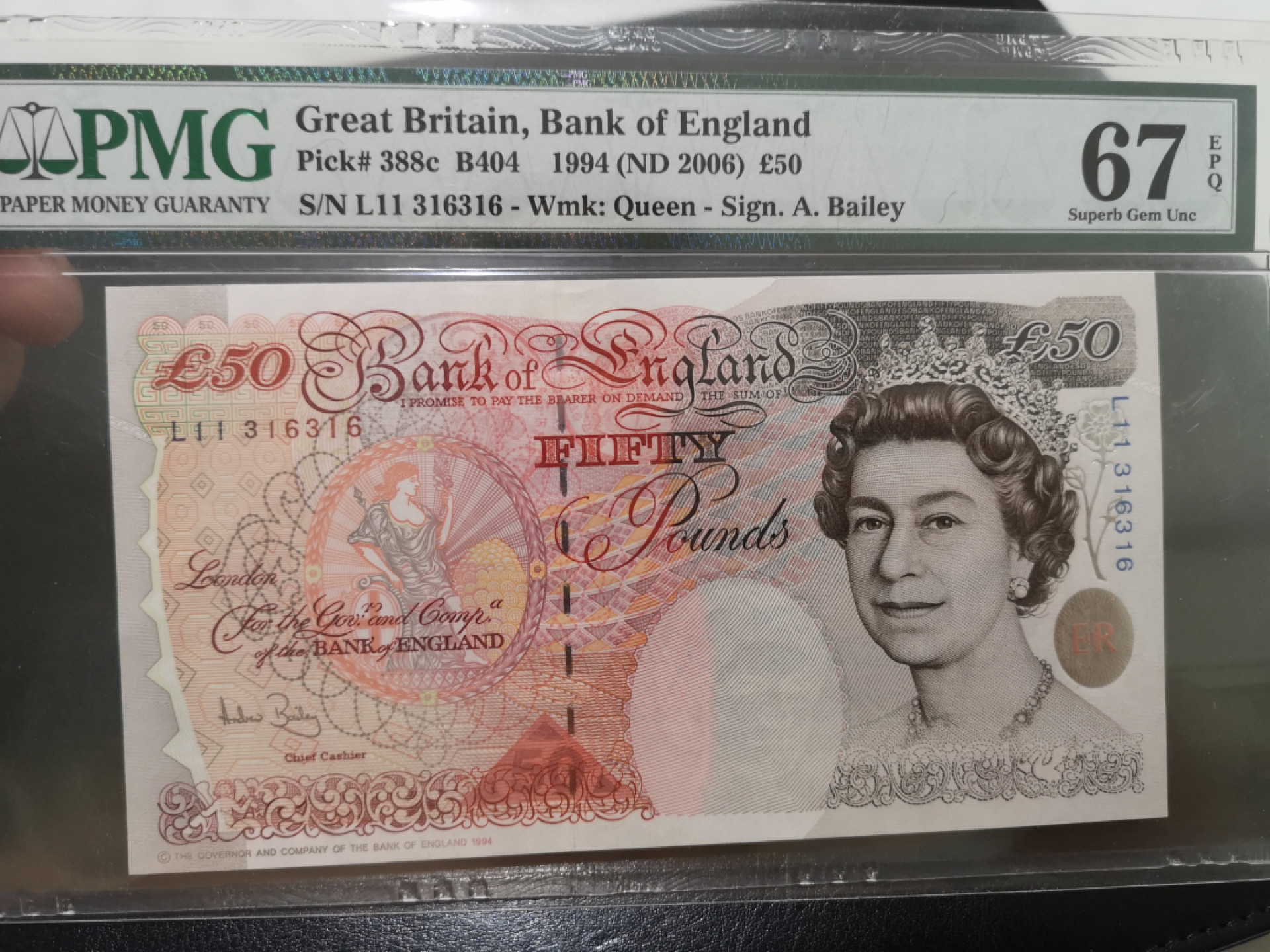 《外钞收藏家》第一百三十期拍卖 1994年英国E序列50镑 PMG67  316重复号 重复号 重复号 
