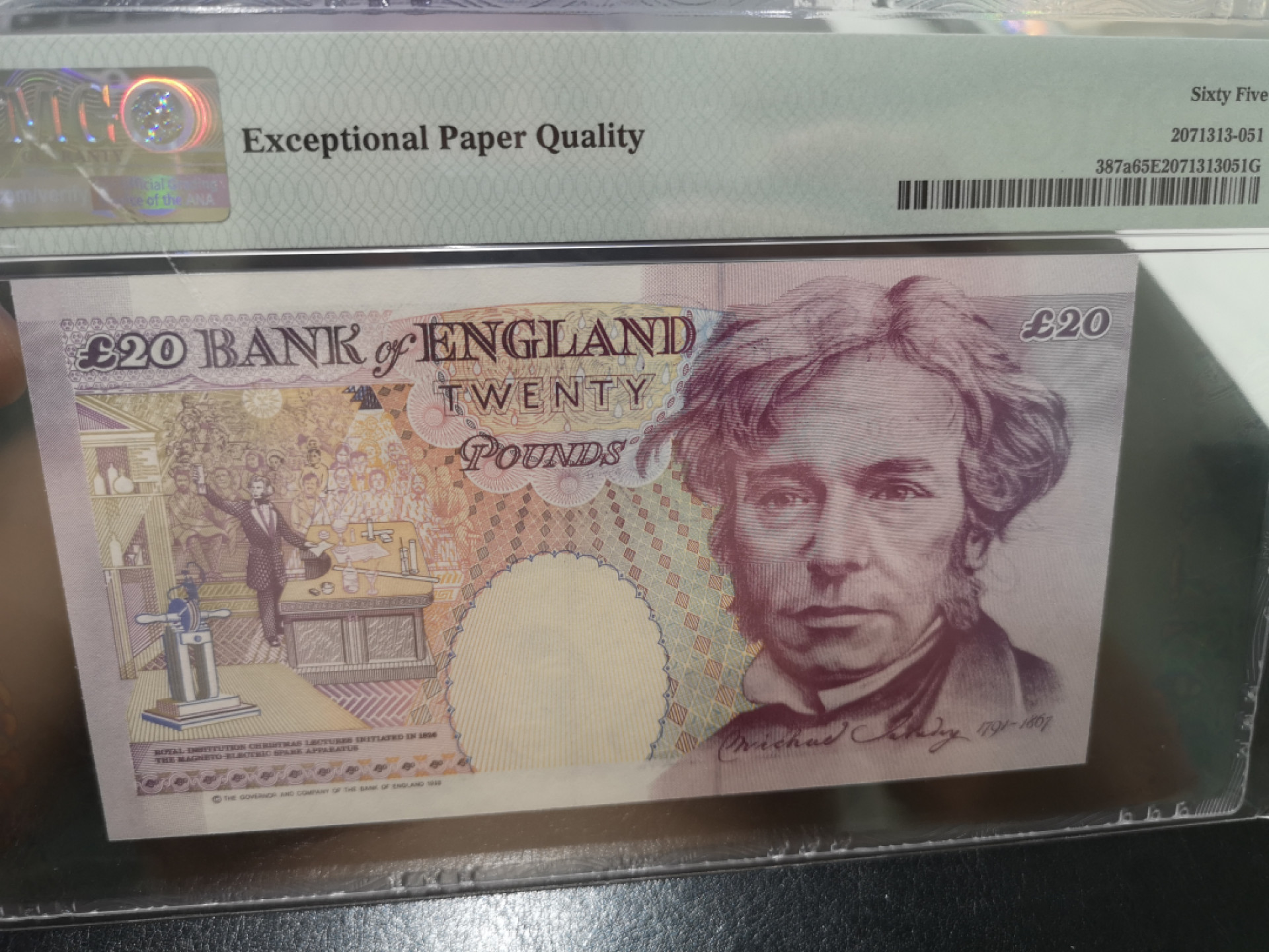 《外钞收藏家》第一百三十期拍卖 1993年英国E序列20镑 PMG65 和上一张是全同号