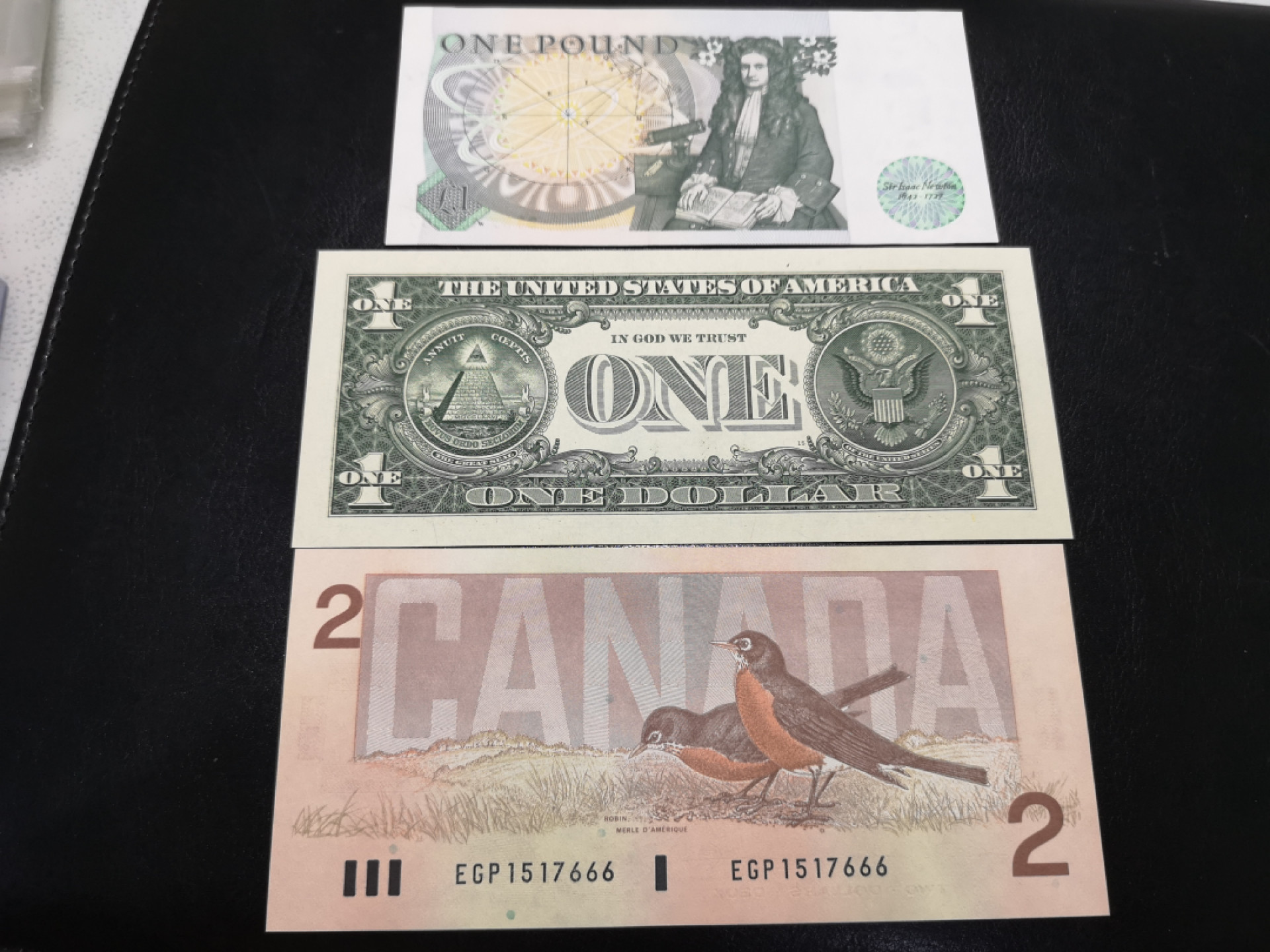 《外钞收藏家》第一百三十期拍卖 美、英、加三国小面额各一张 加拿大是666豹子号 美元是狮子号 全新UNC