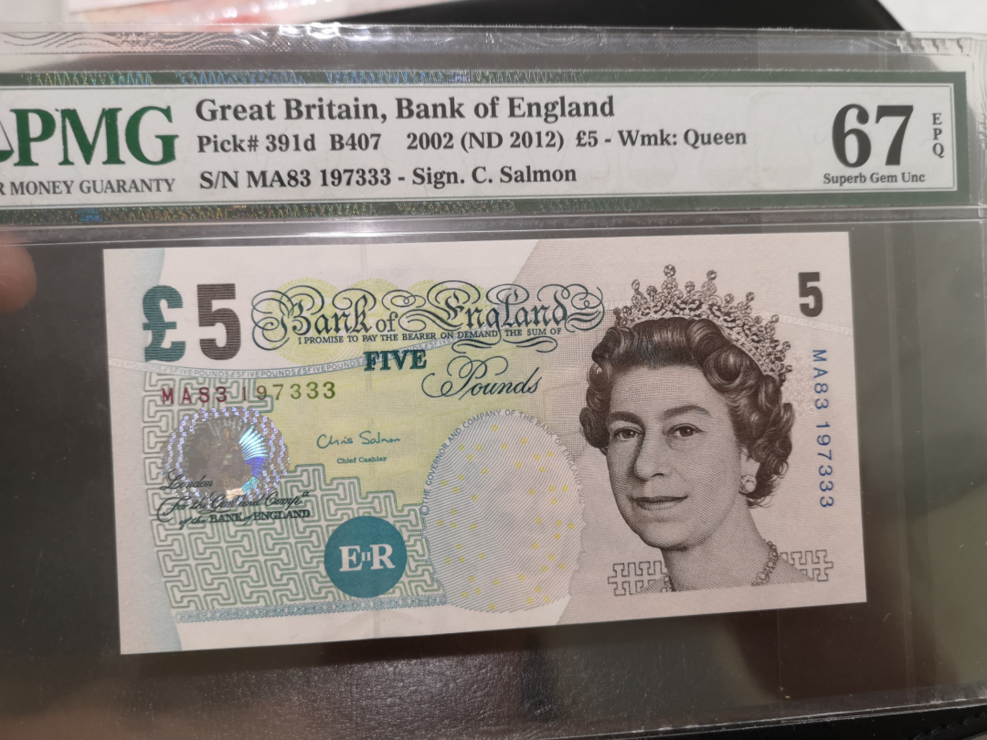 《外钞收藏家》第一百三十期拍卖 2002年英国E序列5镑 PMG67 333豹子号