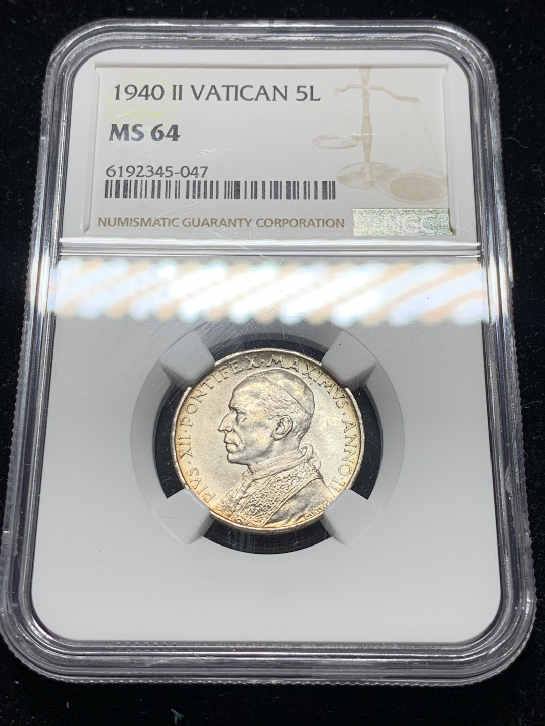 《竞宝斋》钱币微拍-第7场（不限金额顺丰包邮） NGC MS64 梵蒂冈 1940年 教皇小船 5里拉 原光 银币 淡彩包浆很漂亮