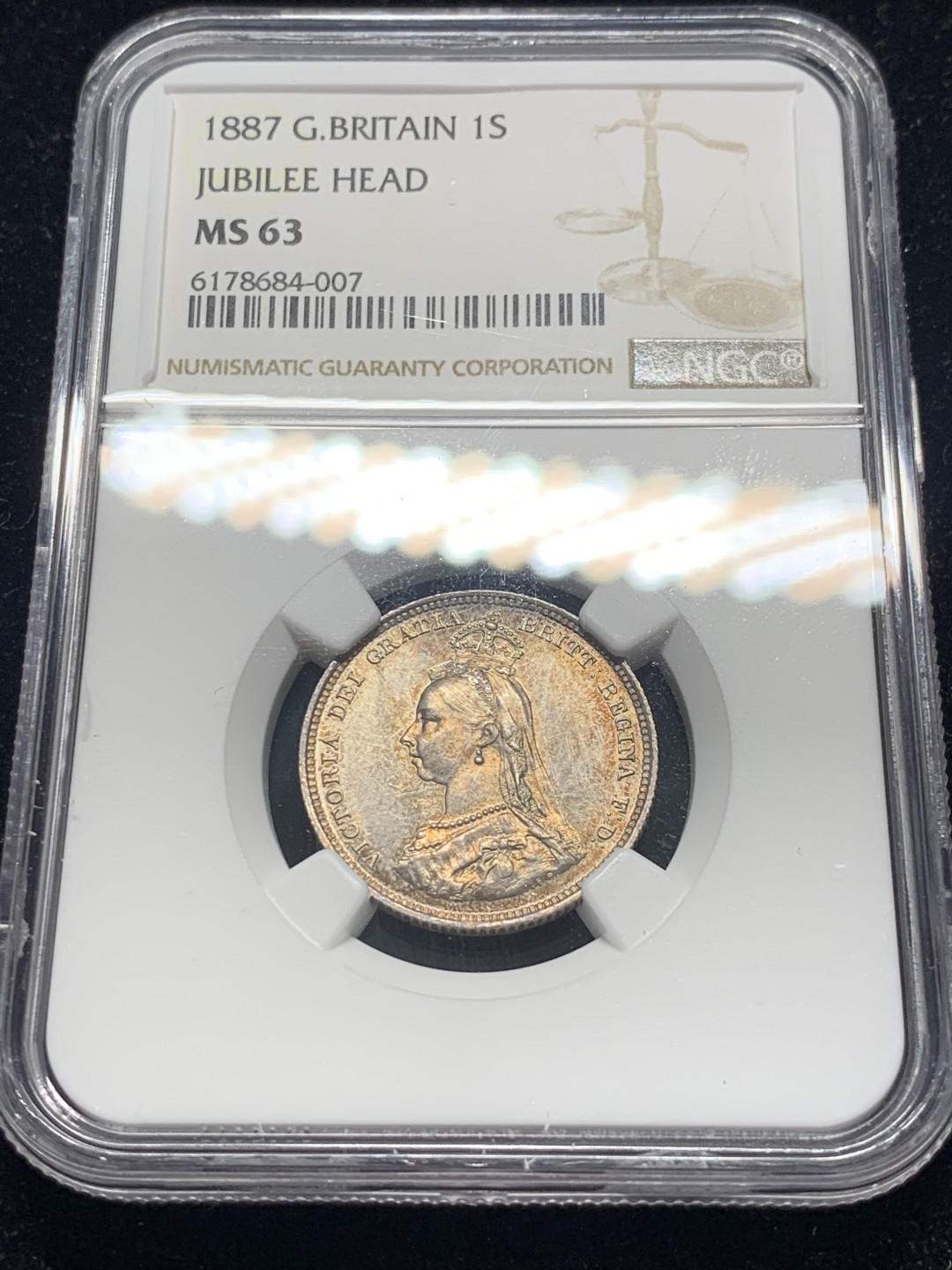 《竞宝斋》钱币微拍-第8场（不限金额顺丰包邮） NGC-MS63 英国1887年维多利亚1先令 NGC编号：6178684-007 双面带黄油光包浆 味道极好