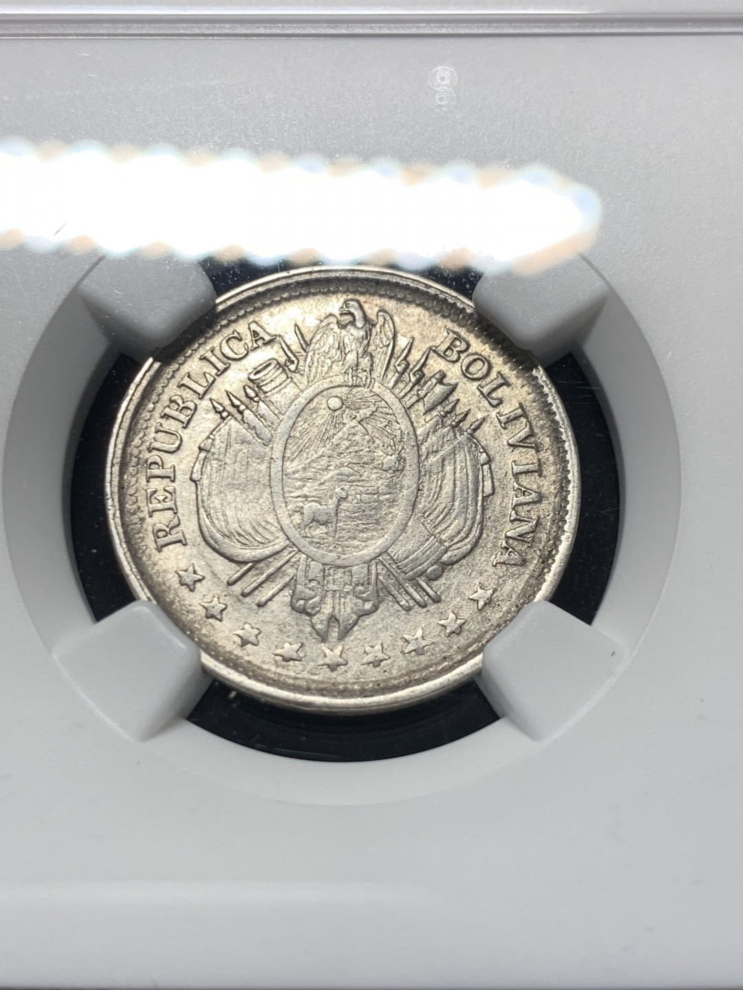 《竞宝斋》钱币微拍-第8场（不限金额顺丰包邮） 亚军 NGC-AU55 玻利维亚 1899年 20分 原光银币 背面是摸裂造成的阳线