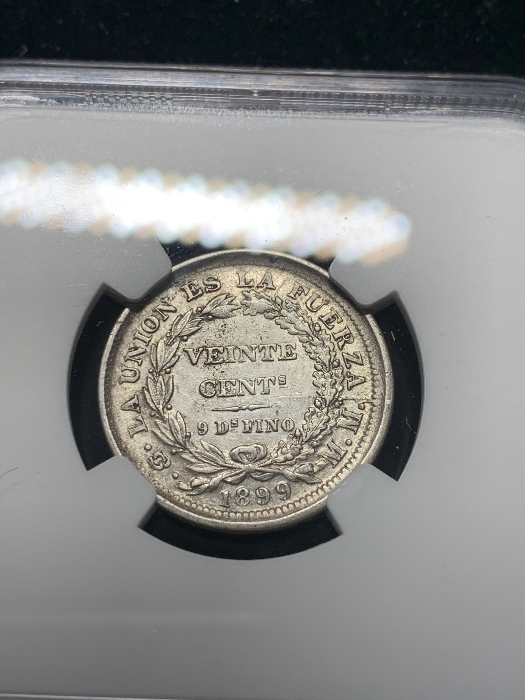 《竞宝斋》钱币微拍-第8场（不限金额顺丰包邮） 亚军 NGC-AU55 玻利维亚 1899年 20分 原光银币 背面是摸裂造成的阳线