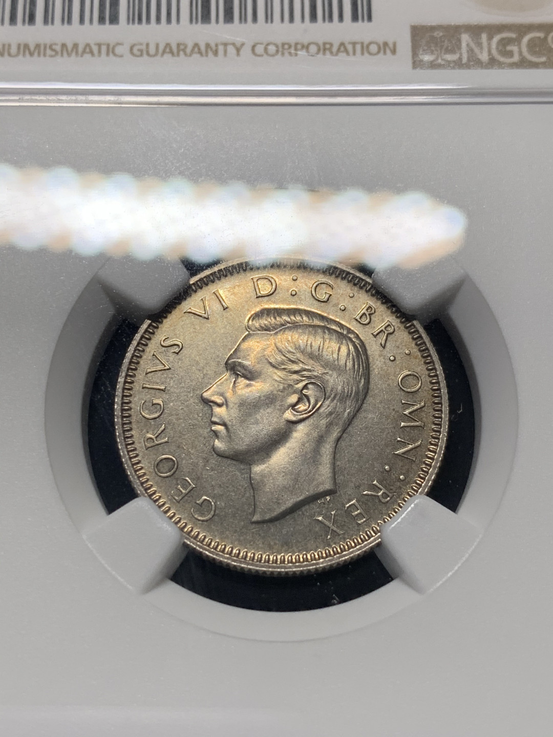 《竞宝斋》钱币微拍-第8场（不限金额顺丰包邮） NGC-PF62 英国1937年乔治六世精制1先令 英格兰版 NGC编号：6183874-007 背面带彩