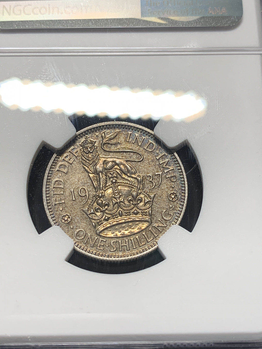 《竞宝斋》钱币微拍-第8场（不限金额顺丰包邮） NGC-PF62 英国1937年乔治六世精制1先令 英格兰版 NGC编号：6183874-007 背面带彩
