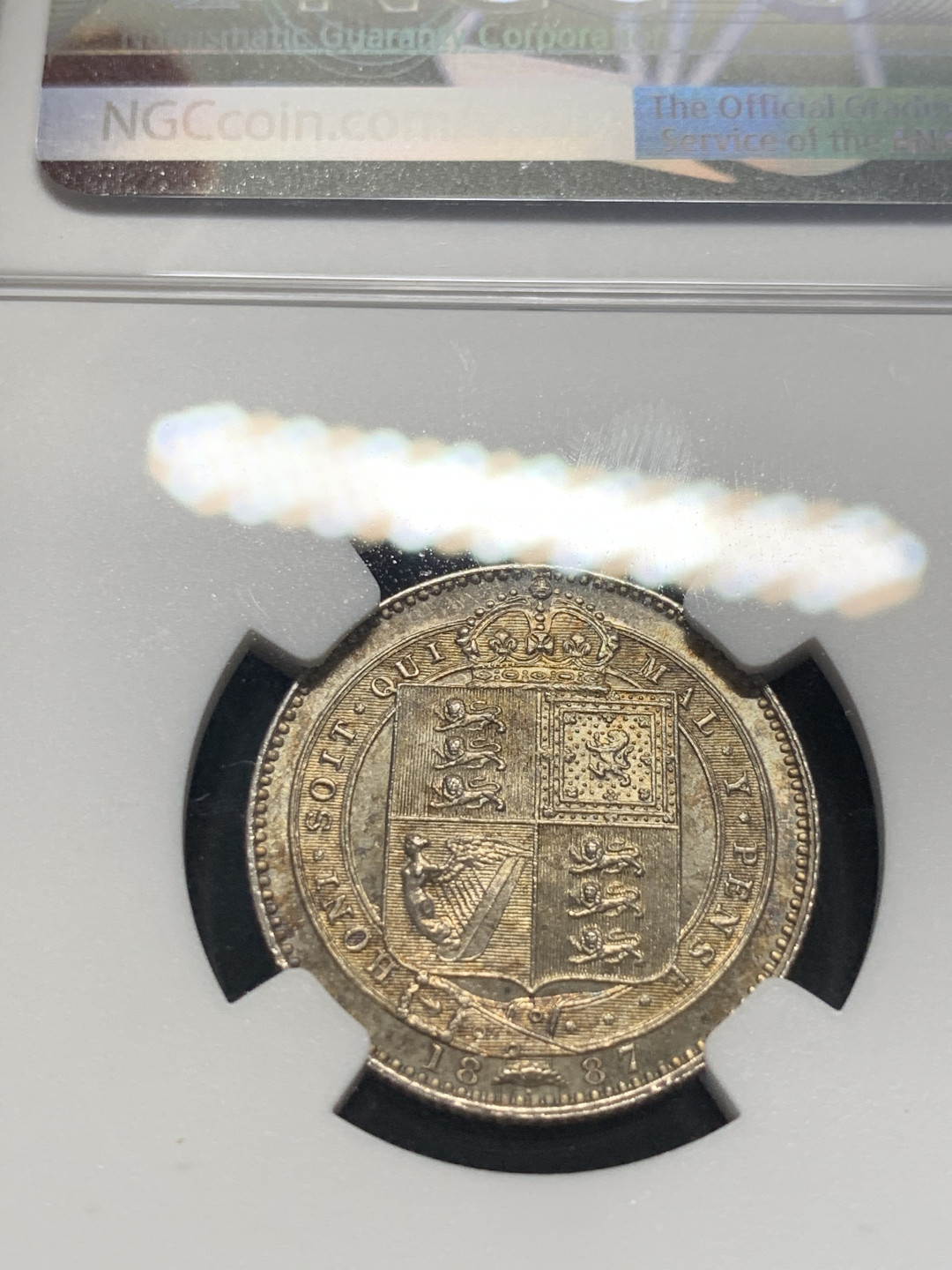 《竞宝斋》钱币微拍-第8场（不限金额顺丰包邮） NGC-MS63 英国1887年维多利亚1先令 NGC编号：6178684-007 双面带黄油光包浆 味道极好