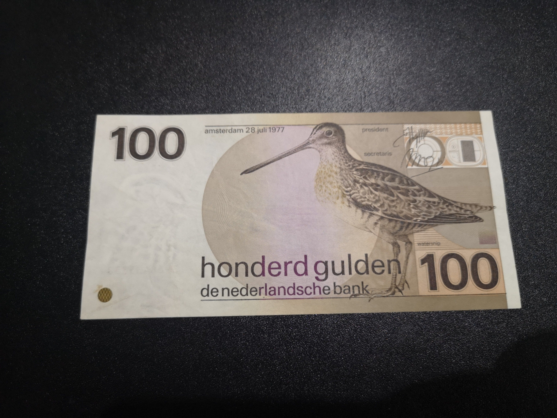 《外钞收藏家》第一百三十六期（本期100件） 1977年荷兰100盾  VF品相 测光如图