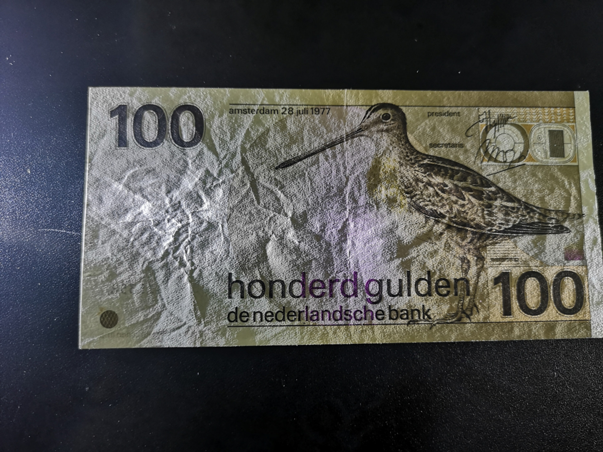 《外钞收藏家》第一百三十六期（本期100件） 1977年荷兰100盾  VF品相 测光如图