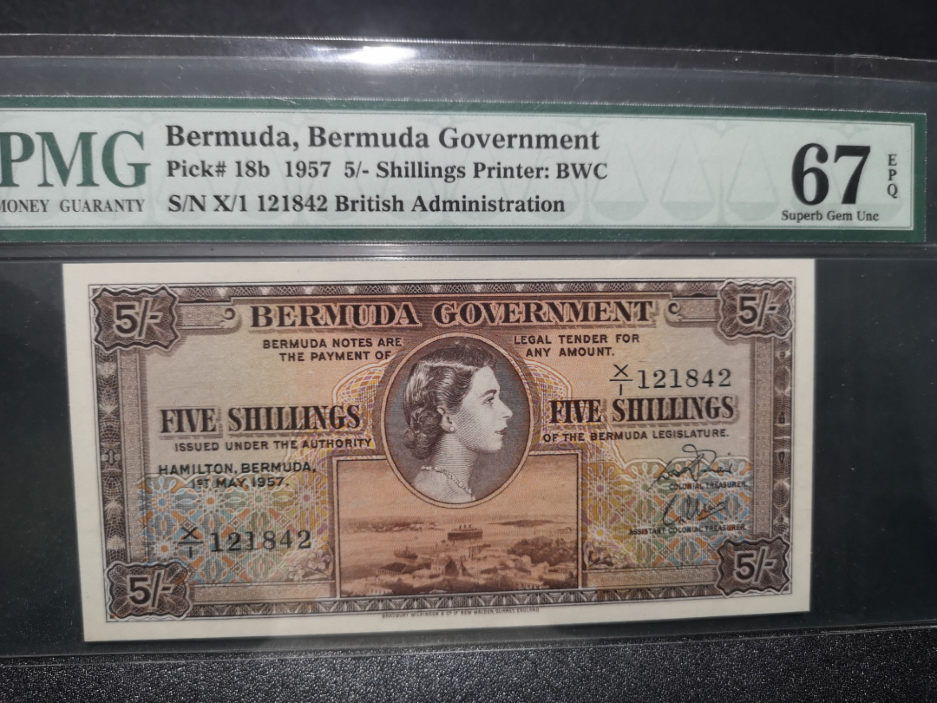 《外钞收藏家》第一百三十八期拍卖（本期91件） 1957年百慕大5先令 女王 PMG67 BWC作品