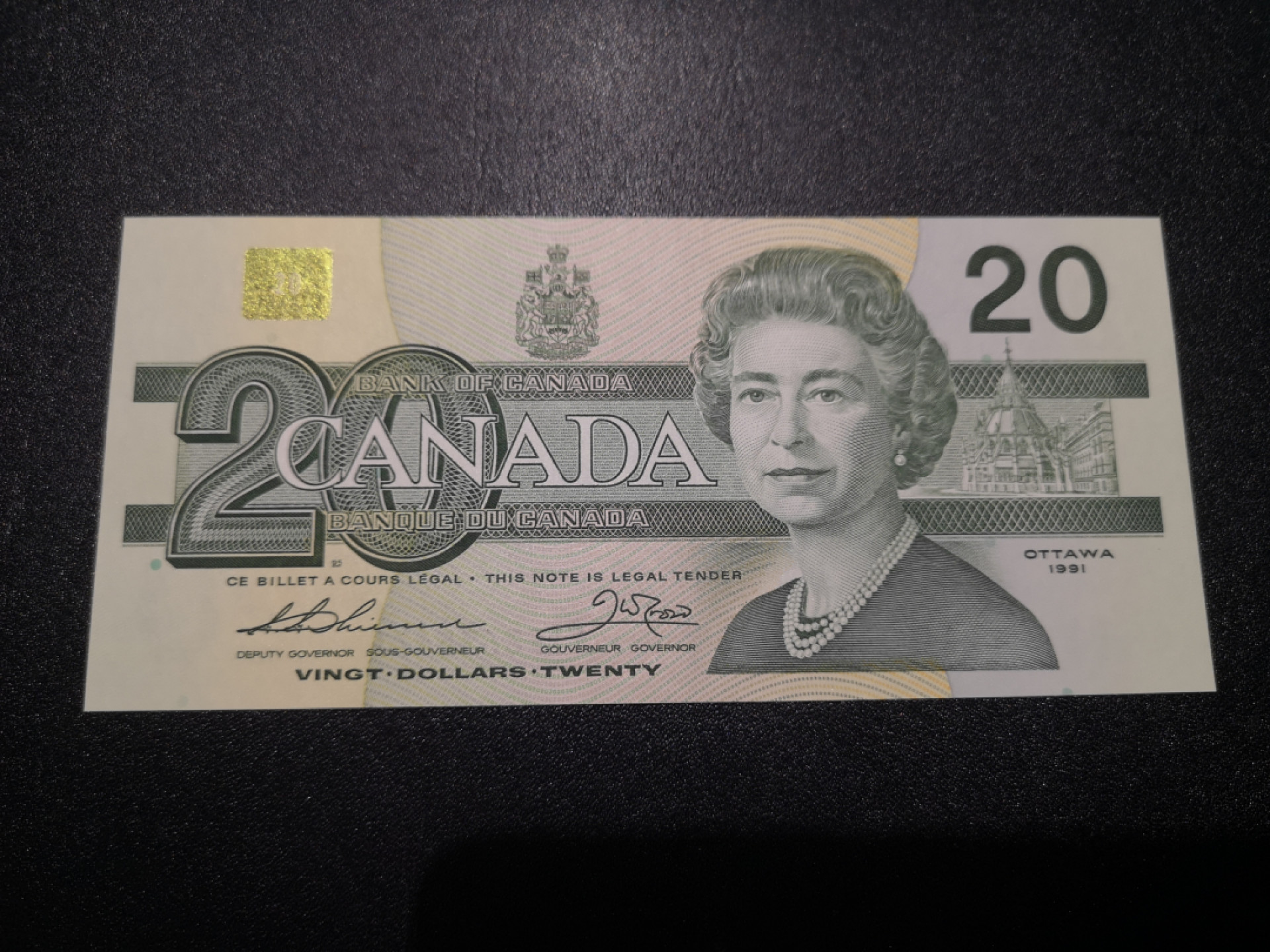 《外钞收藏家》第一百三十九期拍卖（本期84件） 1991年加拿大鸟版20 AU品相 有疑似中折