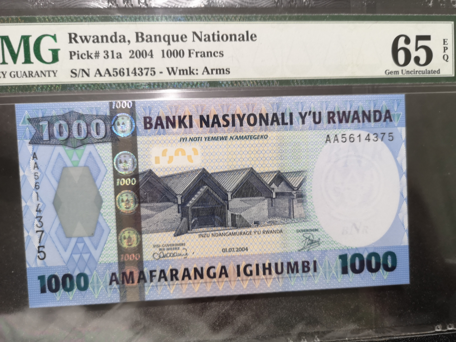《外钞收藏家》第一百三十九期拍卖（本期84件） 2004年卢旺达1000法郎 PMG65 AA冠