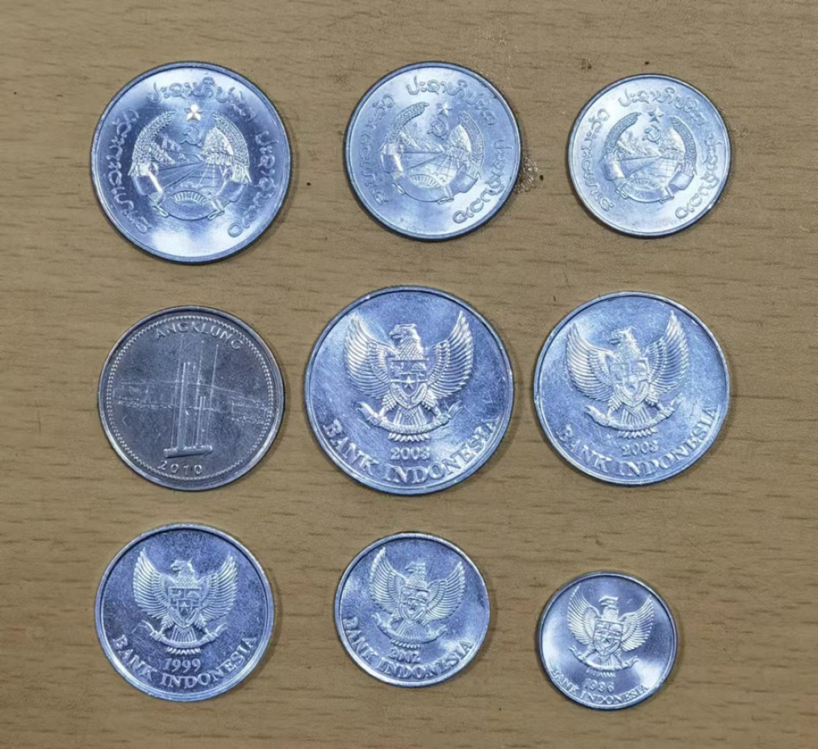 北京马甸外币专卖微拍第六十三期，非贵金属外国流通币，纪念币专场，陆续上新欢迎关注 印尼，老挝两套