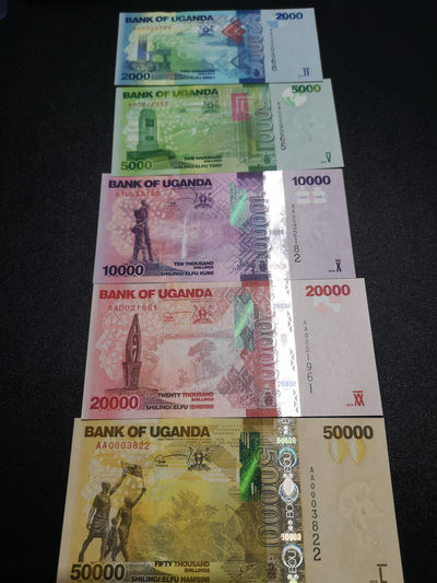 《外钞收藏家》第一百四十期拍卖（本期96件） - 乌干达一套五张 AA冠 全新UNC 全部无47靓号