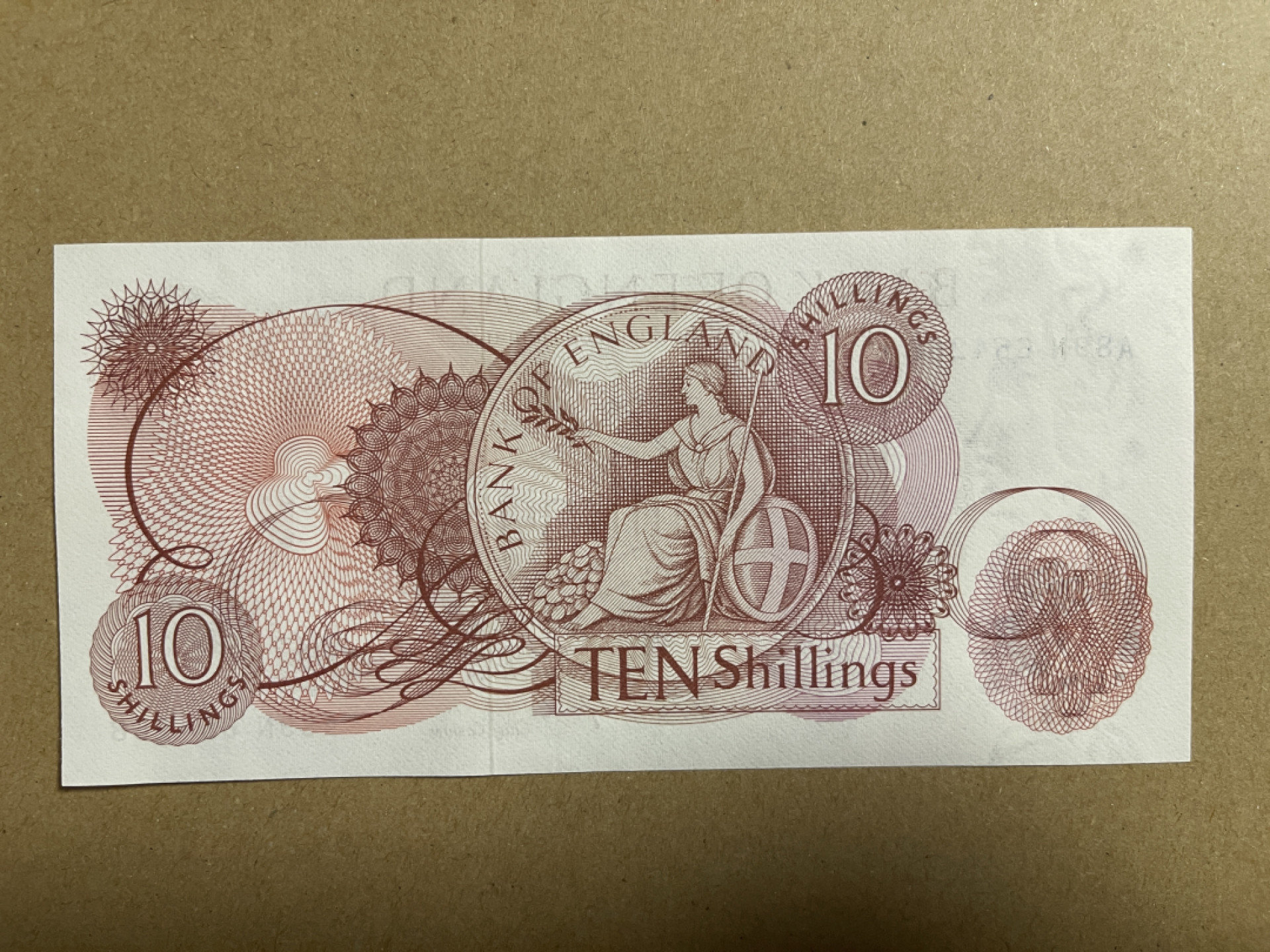 《张总收藏》40期—世界美钞 英镑10先令 UNC C序列