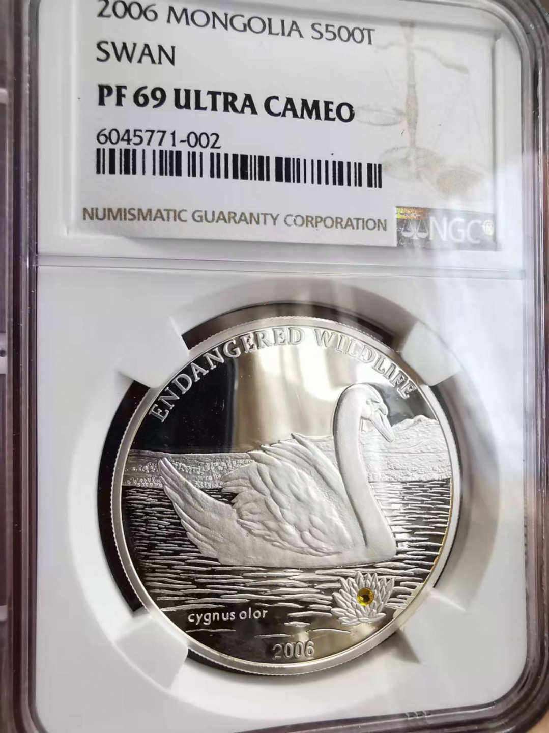 凡希社世界钱币微拍第一百七十五期 2006蒙古天鹅500图格里克镶钻币NGC-PF69UC