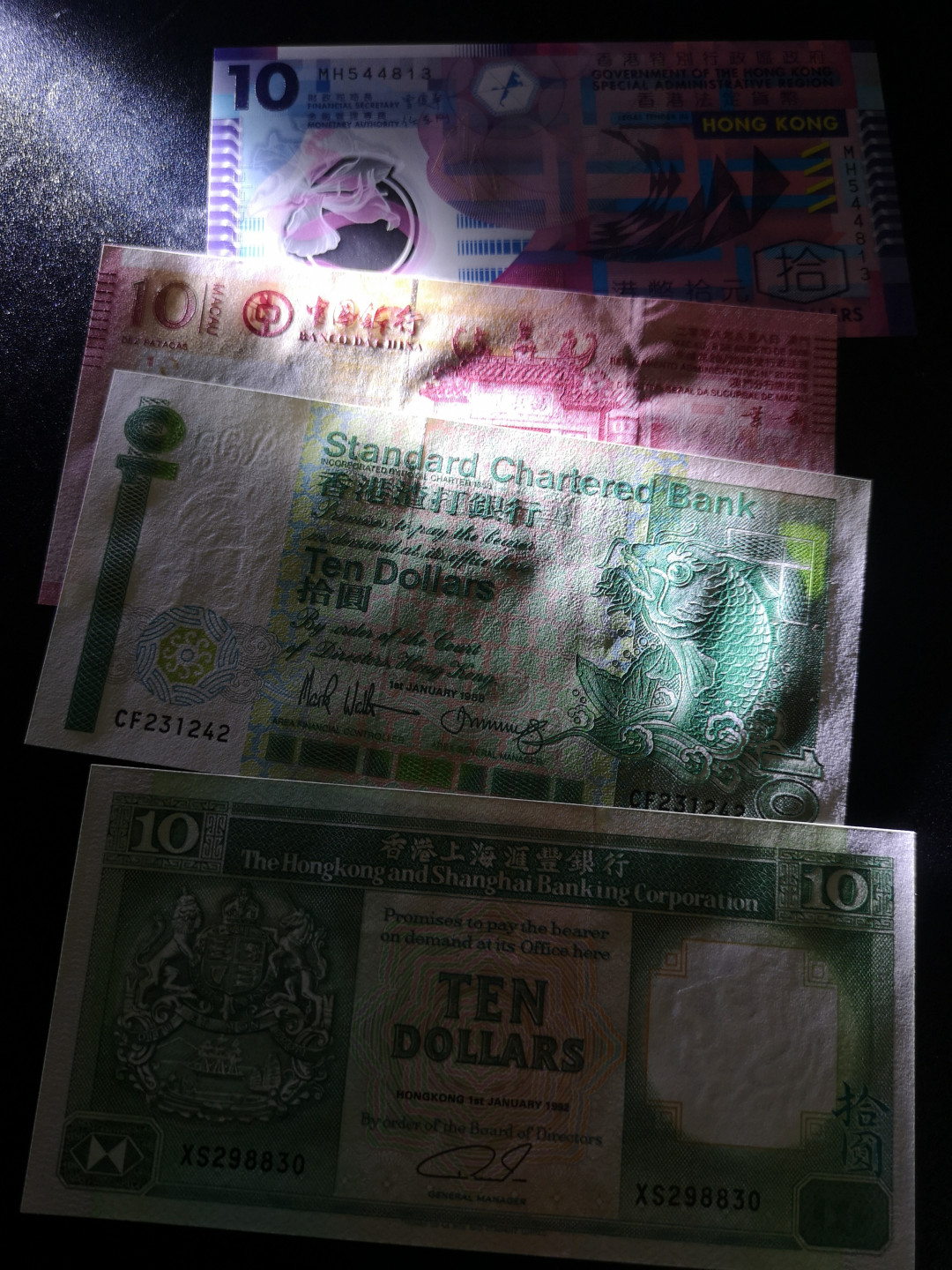 《外钞收藏家》第一百四十一期拍卖（本期81件） 港币、澳门币10元 四张一起  全新UNC