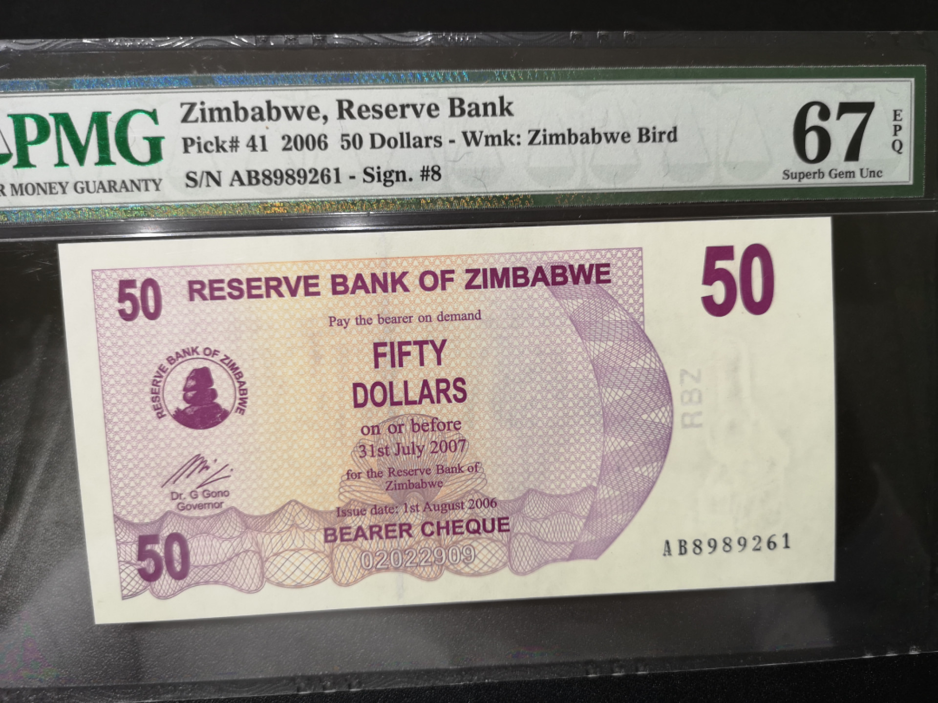 《外钞收藏家》第一百四十二期拍卖（周三拍场） 2006年津巴布韦 50刀 PMG67 无47