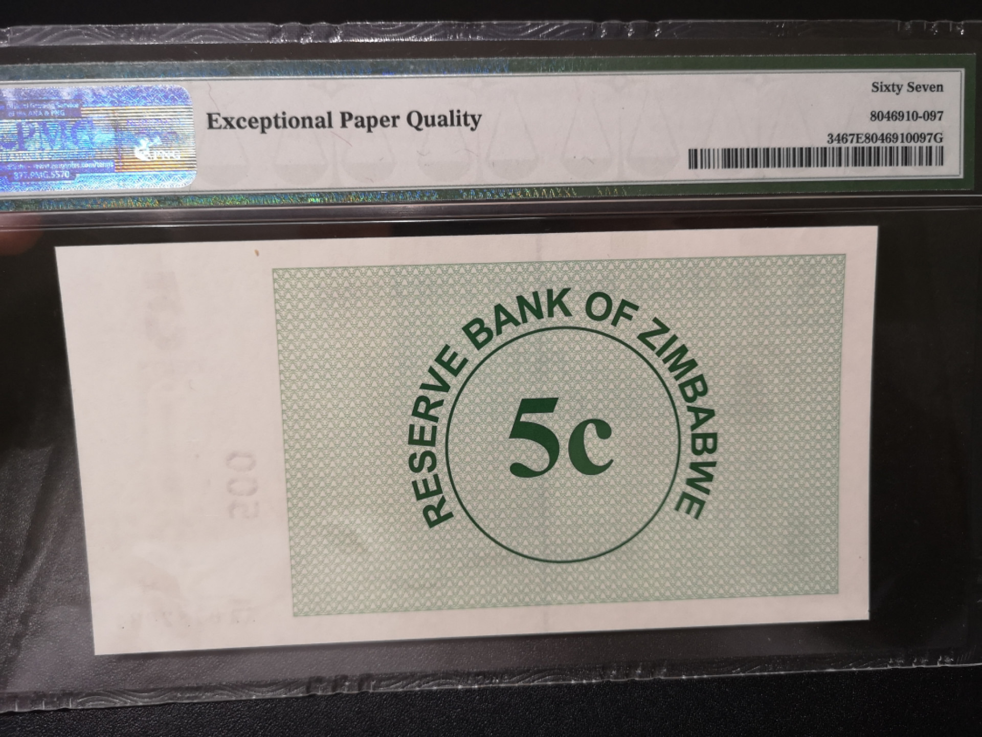 《外钞收藏家》第一百四十二期拍卖（周三拍场） 2006年津巴布韦 5分 PMG67