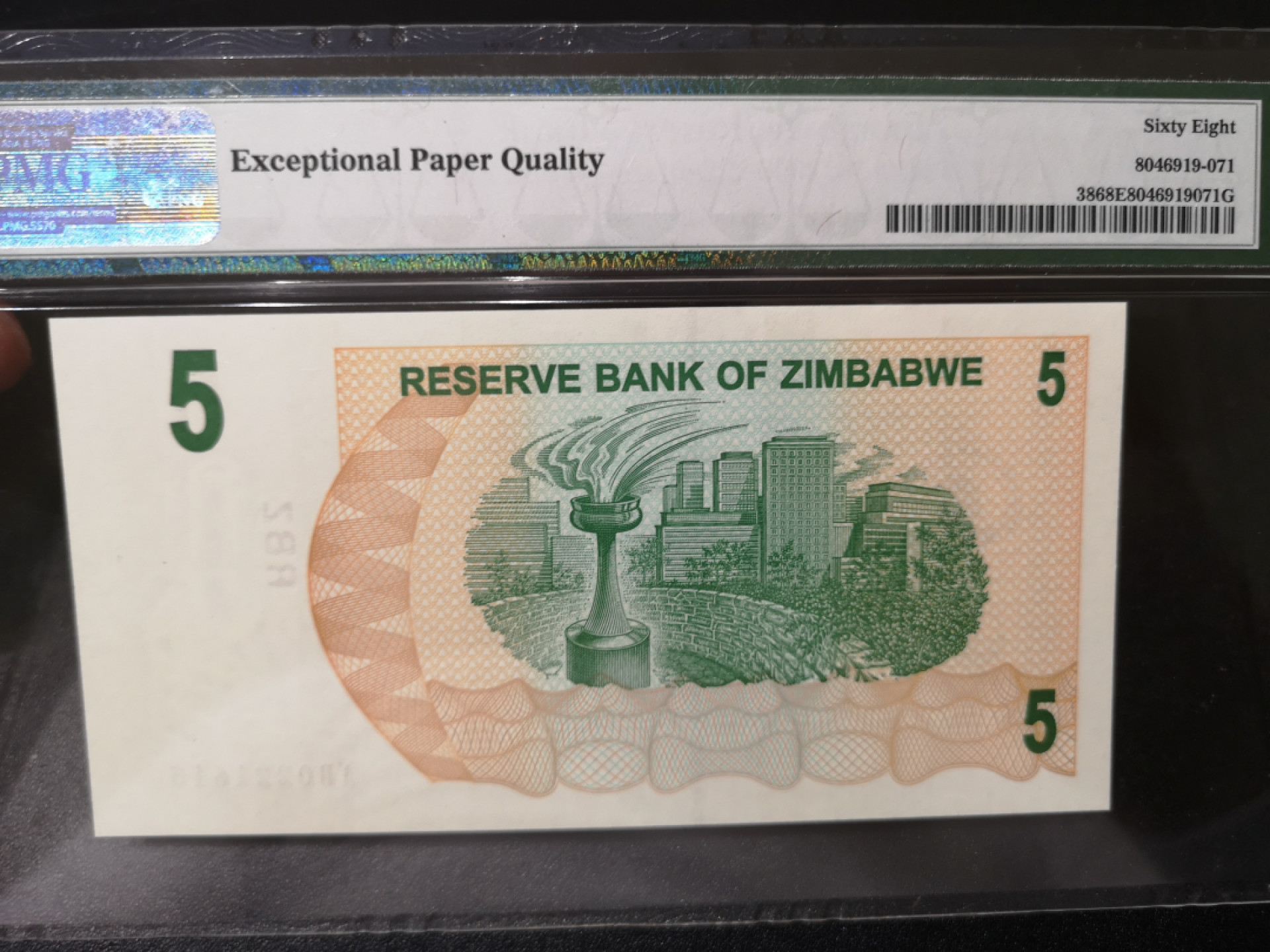 《外钞收藏家》第一百四十二期拍卖（周三拍场） 2006年津巴布韦5刀 PMG68 无47