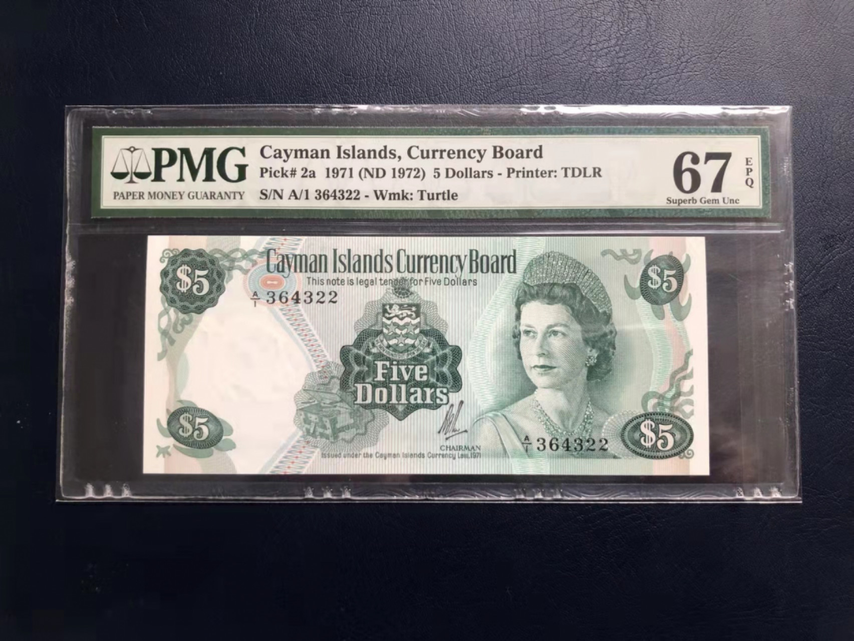 《张总收藏》41期—欧洲强钞 1971年开曼群岛初版首发A1冠5元PMG67E，Pick-2a，71年版本是最老版本