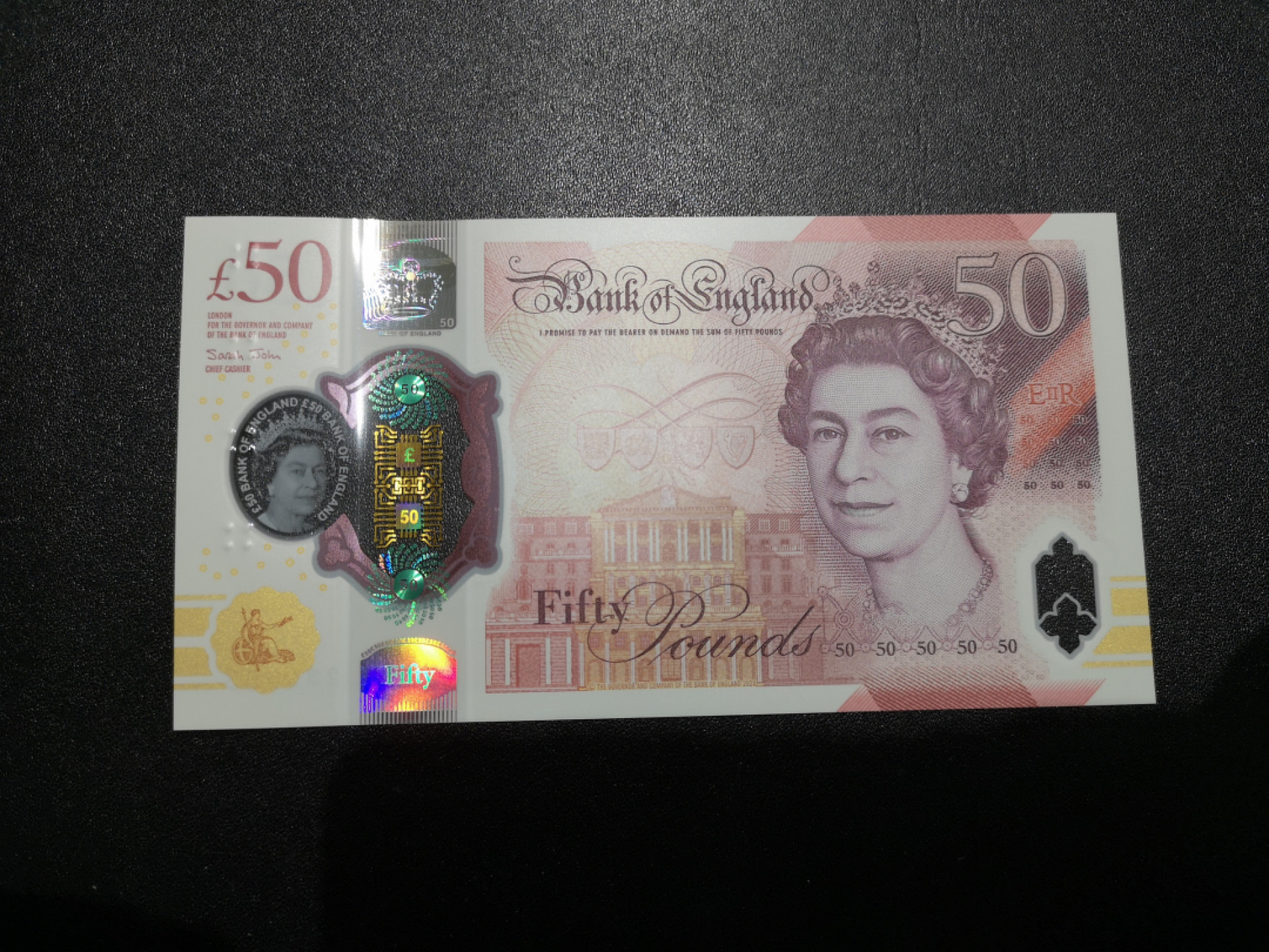《外钞收藏家》第一百四十四期拍卖（本期85件） 英国最新版塑料钞50镑 AA01首发冠 无47 全新UNC