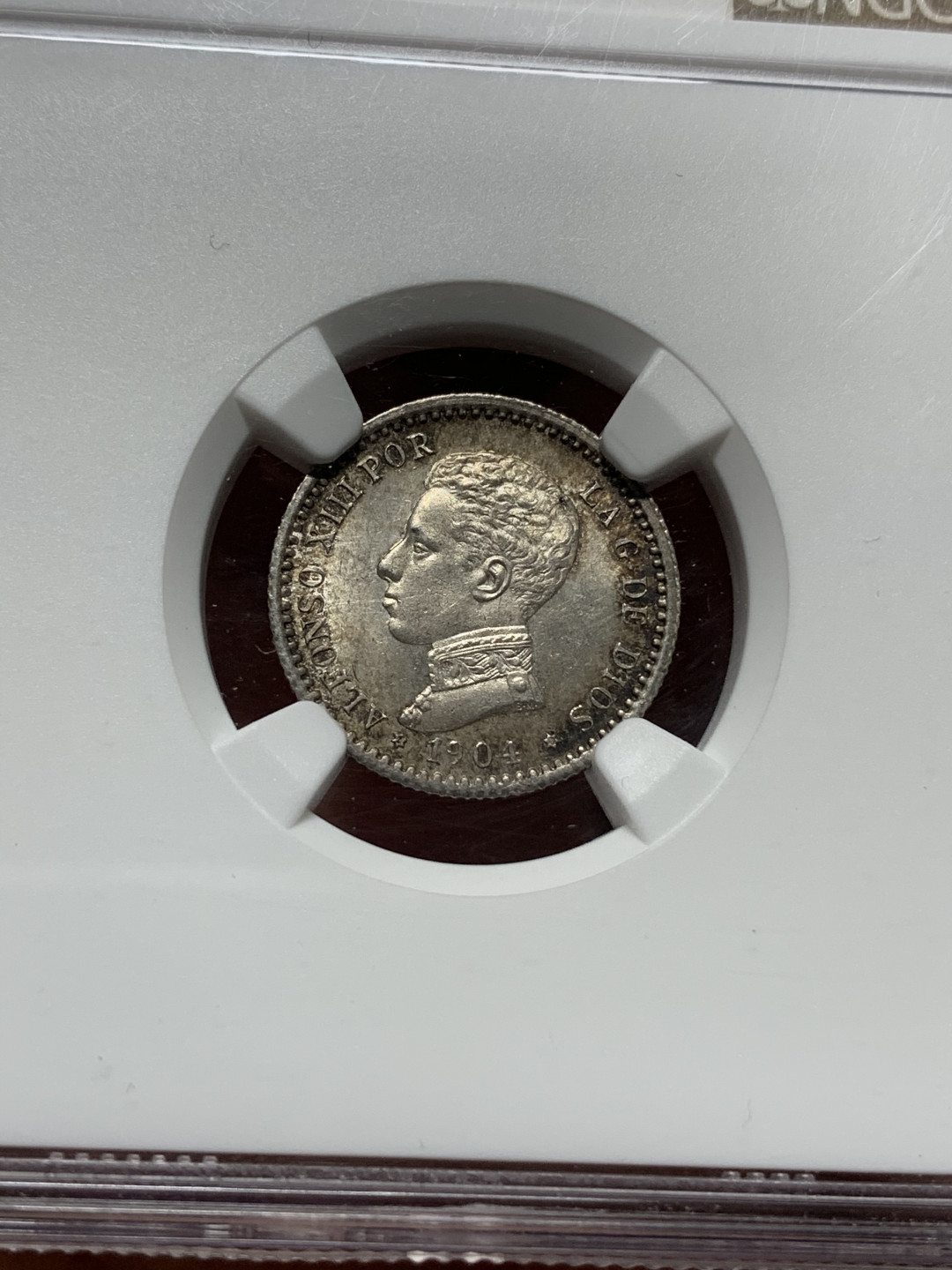 《竞宝斋》钱币微拍-第13场-本周日，周一2场连拍（全场顺丰包邮） NGC-MS64 西班牙1904年50分 五彩深包浆，细节漂亮