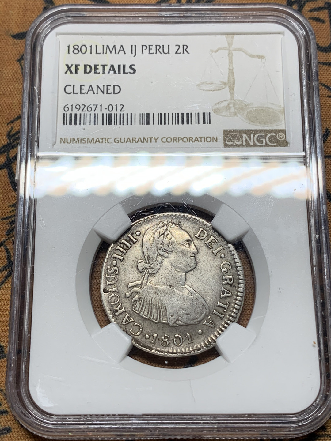 《竞宝斋》钱币微拍-第13场-本周日，周一2场连拍（全场顺丰包邮） NGC-XF 秘鲁 1801年 卡洛斯四世 2R 银币 原味品 没分可惜