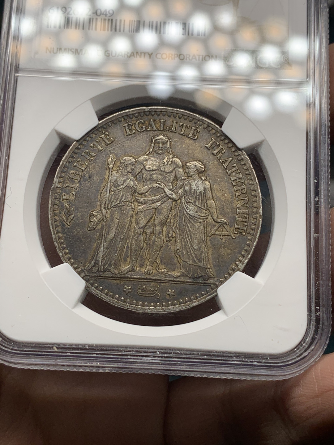 《竞宝斋》钱币微拍-第13场-本周日，周一2场连拍（全场顺丰包邮） NGC-AU50 法国 1875-A年 “小A版” 5法郎 银币 黑包浆 原味 稀少版式