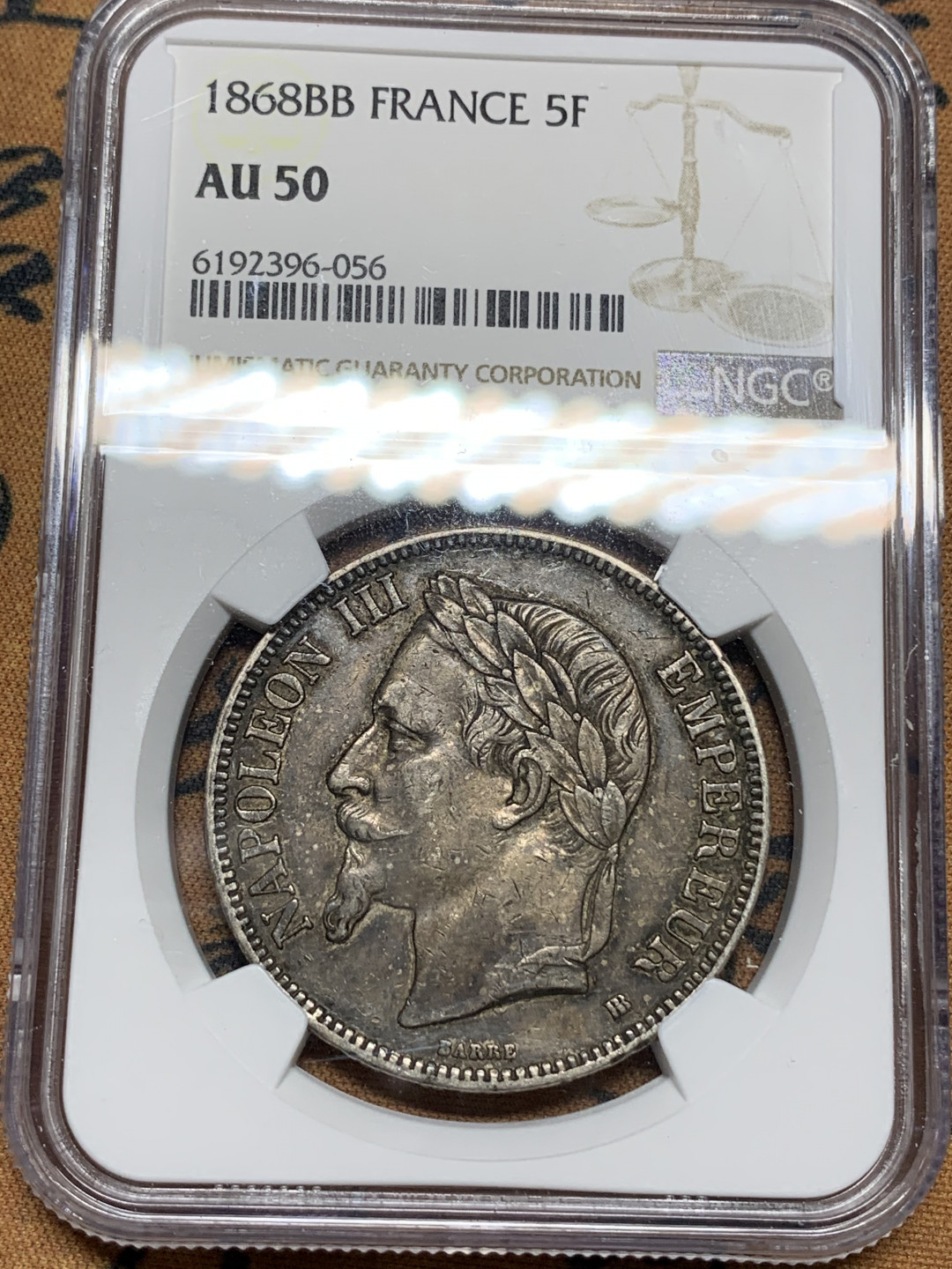 《竞宝斋》钱币微拍-第13场-本周日，周一2场连拍（全场顺丰包邮） NGC-AU50 法国 1868-BB年 拿破仑三世 5法郎 银币 黑包浆 味道一流 现在这样的包浆基本都不给分了