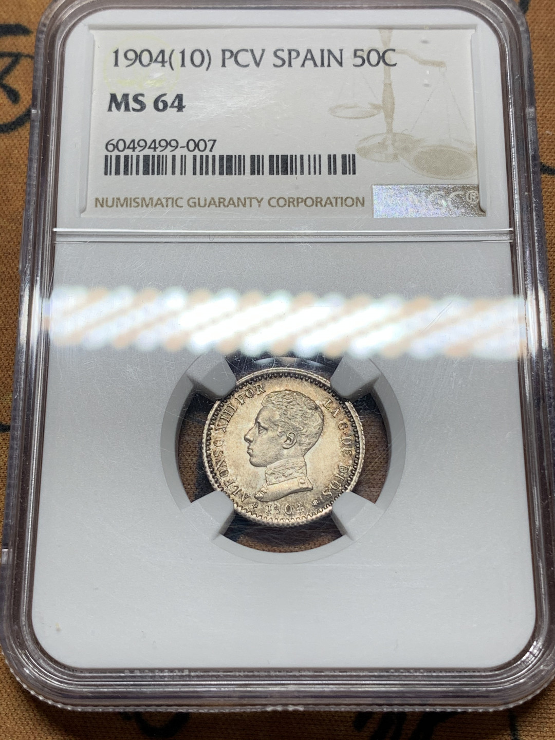 《竞宝斋》钱币微拍-第13场-本周日，周一2场连拍（全场顺丰包邮） NGC-MS64 西班牙1904年50分 五彩深包浆，细节漂亮