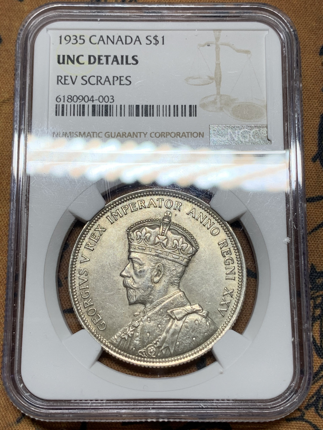《竞宝斋》钱币微拍-第13场-本周日，周一2场连拍（全场顺丰包邮） NGC-UNC 加拿大 1935年 乔五 1元 银币 原光好品