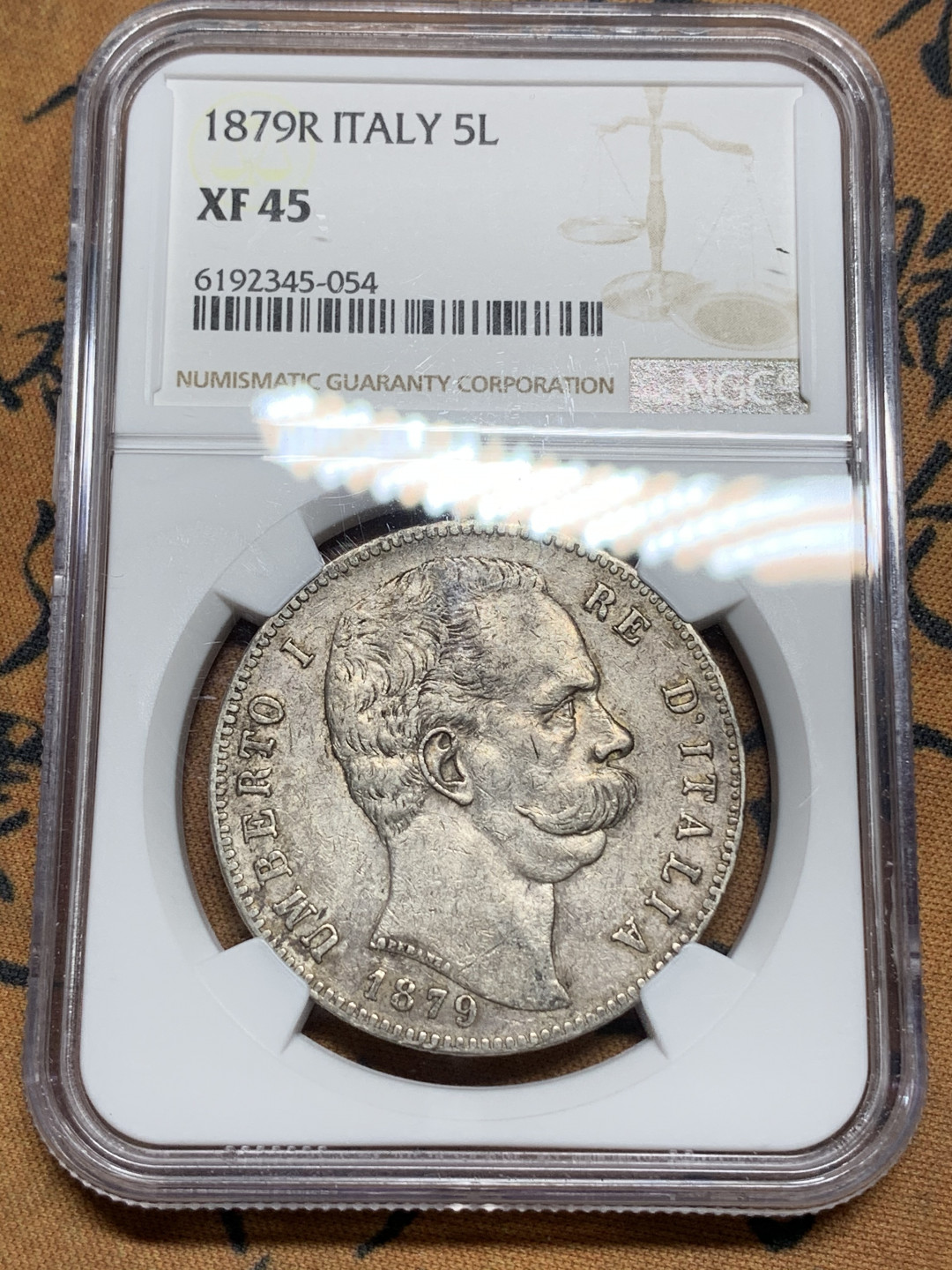 《竞宝斋》钱币微拍-第13场-本周日，周一2场连拍（全场顺丰包邮） NGC-XF45 意大利 1879-R年 翁贝托 5里拉 原味好品 银币