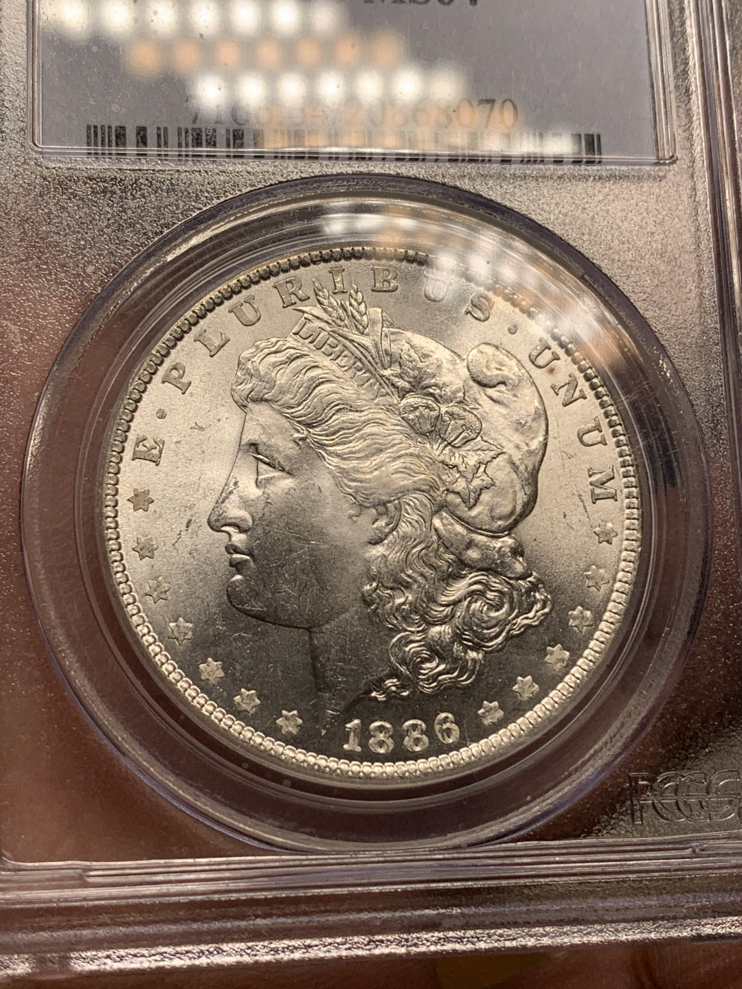 《竞宝斋》钱币微拍-第13场-本周日，周一2场连拍（全场顺丰包邮） pcgs-MS64 美国 1886年 1元摩根银币，原光出厂状态