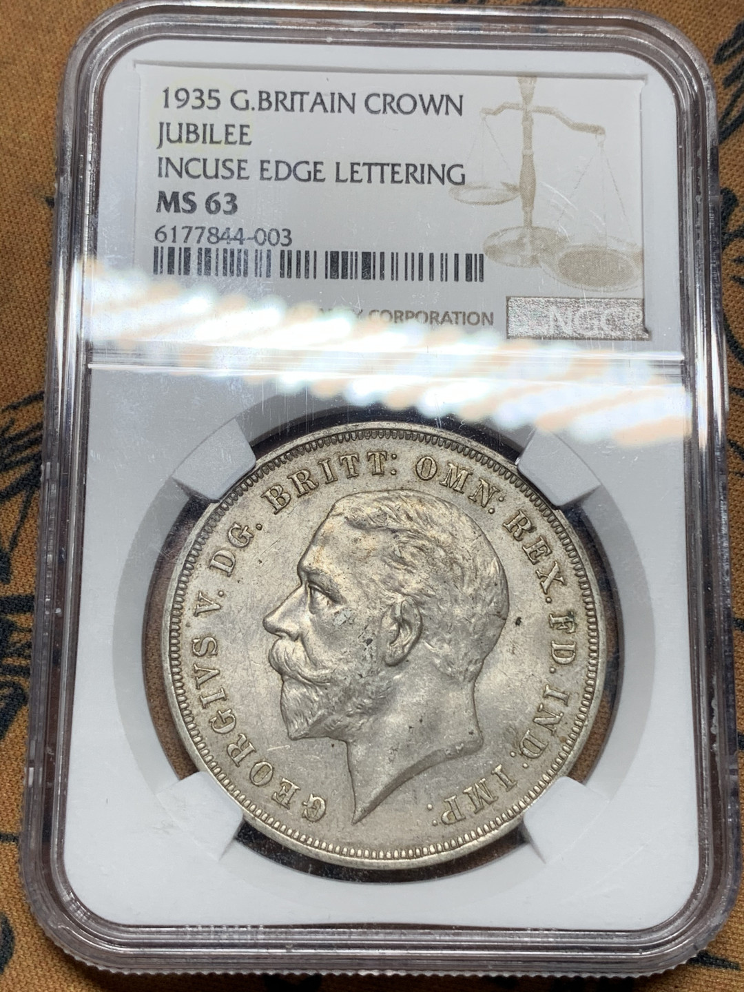 《竞宝斋》钱币微拍-第13场-本周日，周一2场连拍（全场顺丰包邮） NGC-MS63 英国 1935年 木马1克朗 淡彩包浆