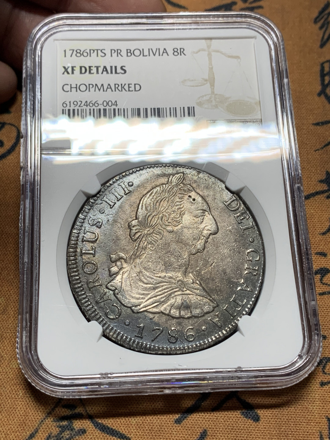 《竞宝斋》钱币微拍-第13场-本周日，周一2场连拍（全场顺丰包邮） NGC 1786年 玻利维亚 卡三 8R 大银币 整体清晰 深包，包浆厚重 人物发髻清晰，具体请看图