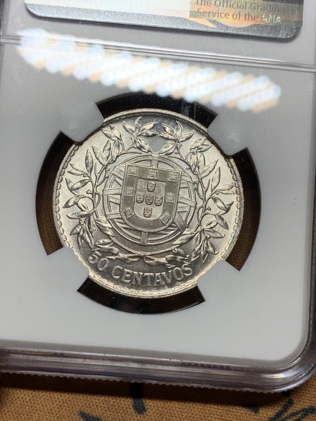 《竞宝斋》钱币微拍-第13场-本周日，周一2场连拍（全场顺丰包邮） NGC-MS63 葡萄牙 1916年 50分 谷物女神 银币 霜光好看 出厂状态，送PCGS或可以得到更高的分数。埃斯库多最近拍卖价都不低。女神漂亮，值得收藏