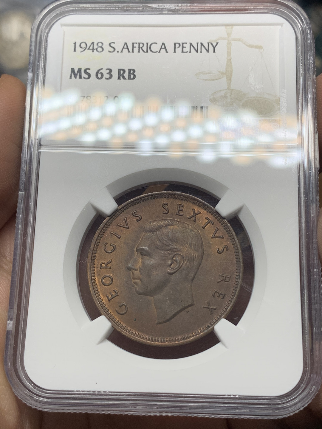 《竞宝斋》钱币微拍-第14场-本周日，周一2场连拍（全场顺丰包邮） 英属南非1948年乔治六世1便士铜币，NGC MS-63RB