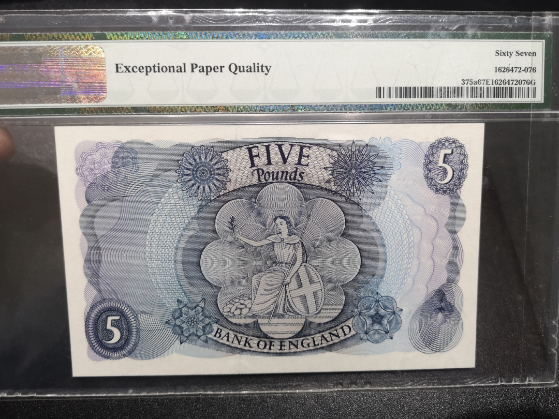 《外钞收藏家》第一百四十六期拍卖-超百件大拍场（本期106件） 英国C序列5镑 PMG67