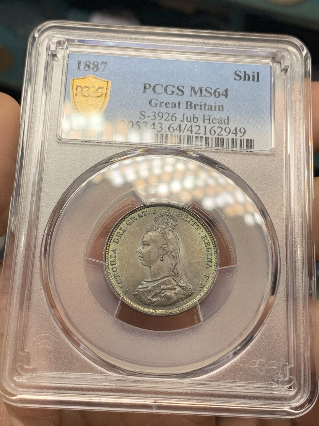 《竞宝斋》钱币微拍-第14场-本周日，周一2场连拍（全场顺丰包邮） PCGS-MS64 英国高分维多利亚1887年1先令 彩色包浆 更高评数只有14枚 热门品种 